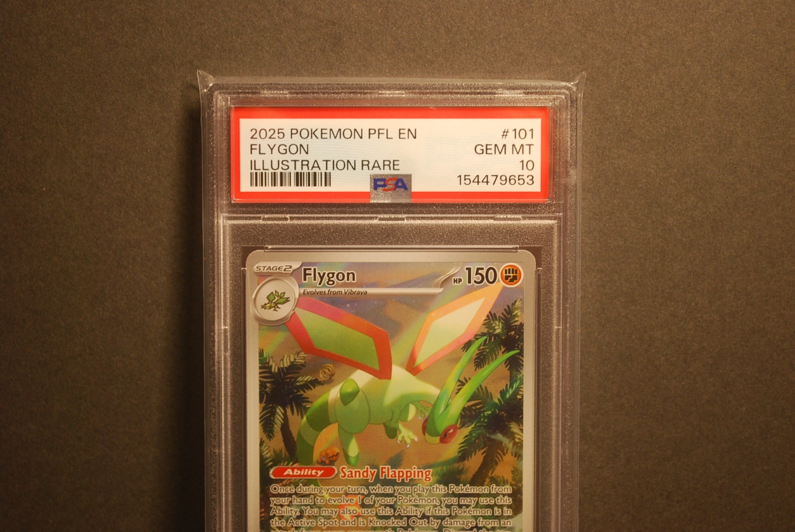 PSA 10 Gem Mint Flygon #101/094 Phantasmal Flames 2025