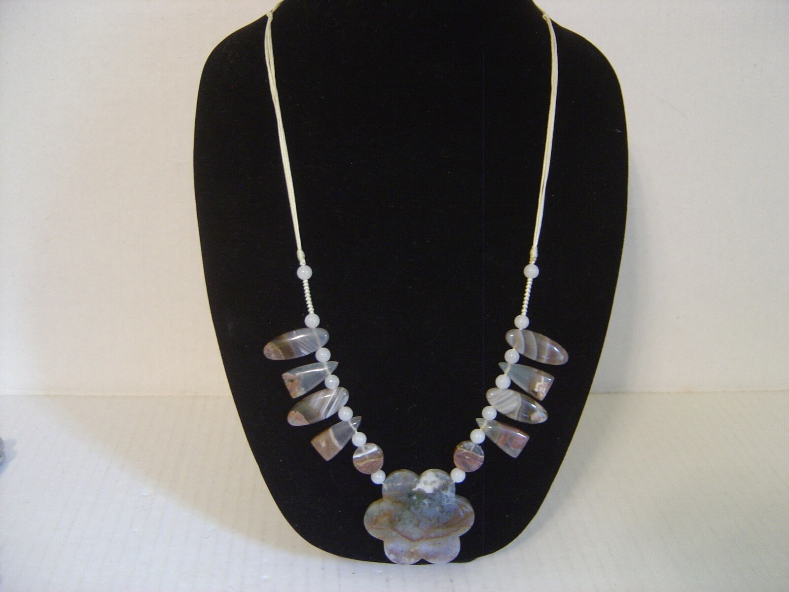 HAND CRAFTED POLISHED STONE AND BEADED NECKLACE PENDANT ON AN ADJUSTABLE CORD