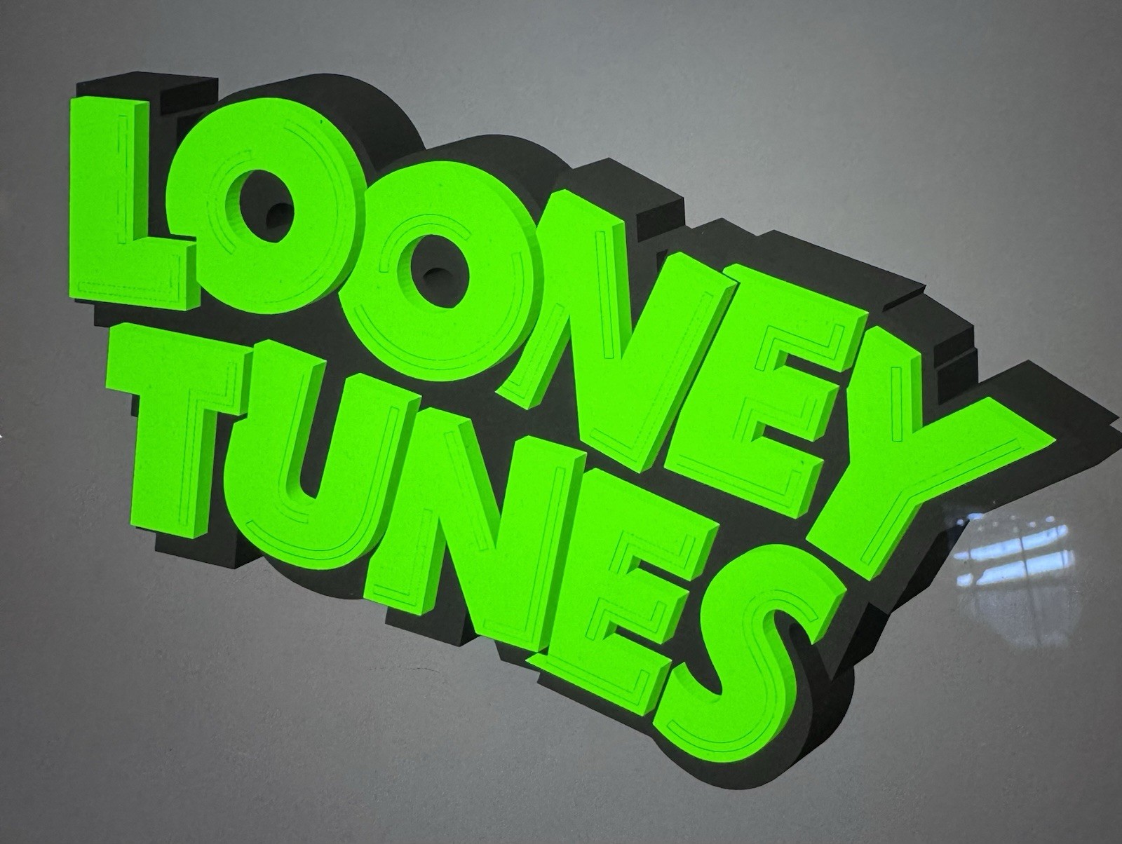 Looney Tunes Desk Logo (11 – 1/8″ wide x 5 – 1/4″ tall x 1 – 1/2″ thick)