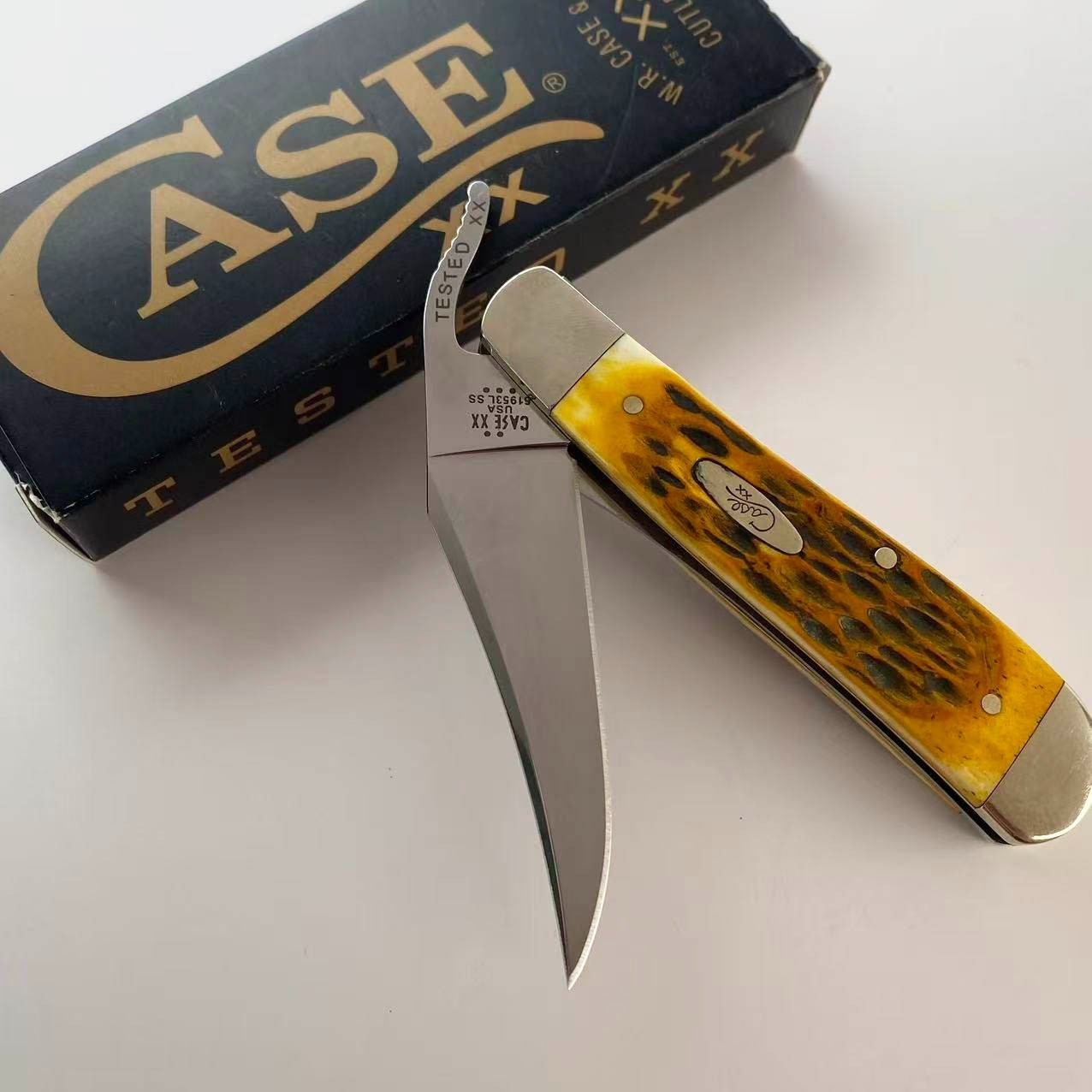 Case xx 00260 Peach Seed Jig Amber Bone RussLock Stainless Folding Pocket Knife