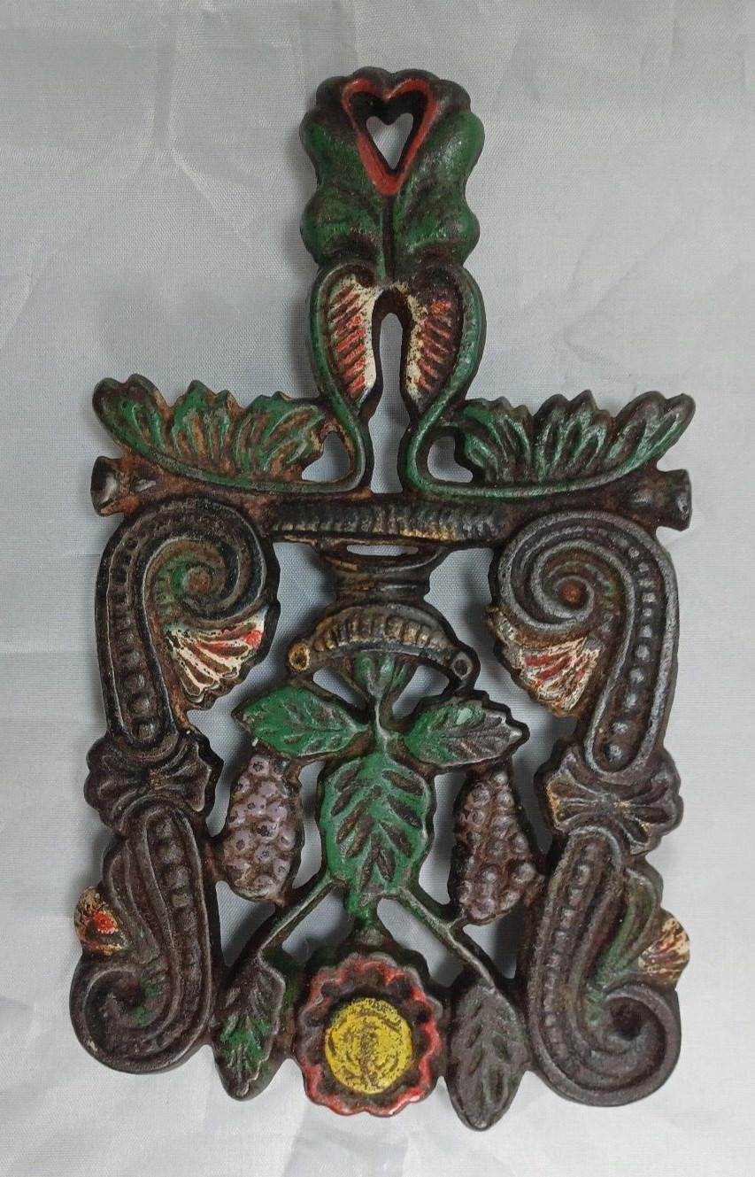 Vtg Cast Iron Trivet Grape Floral Scroll Design 7″ Footed Hot Pad Heart Handle