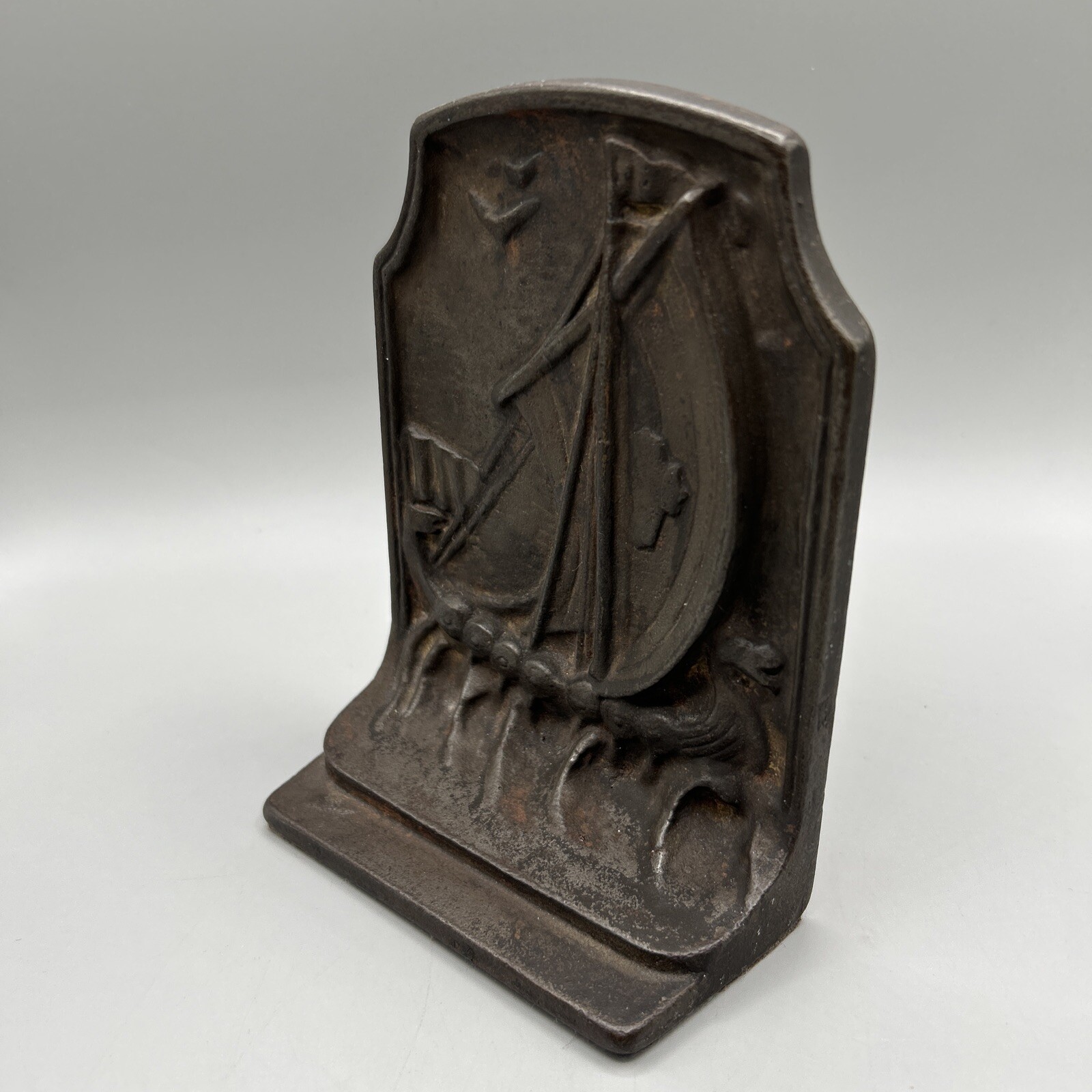 Cast Iron Bookend with Nordic Ship, weighs 2.25 lb., early 20th century, Antique