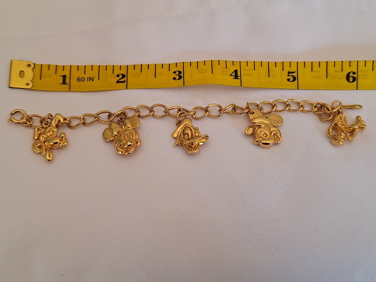 VTG Disney Charm Bracelet Gold Tone with 5 Characters 6.5 in. Long DISNEY signed