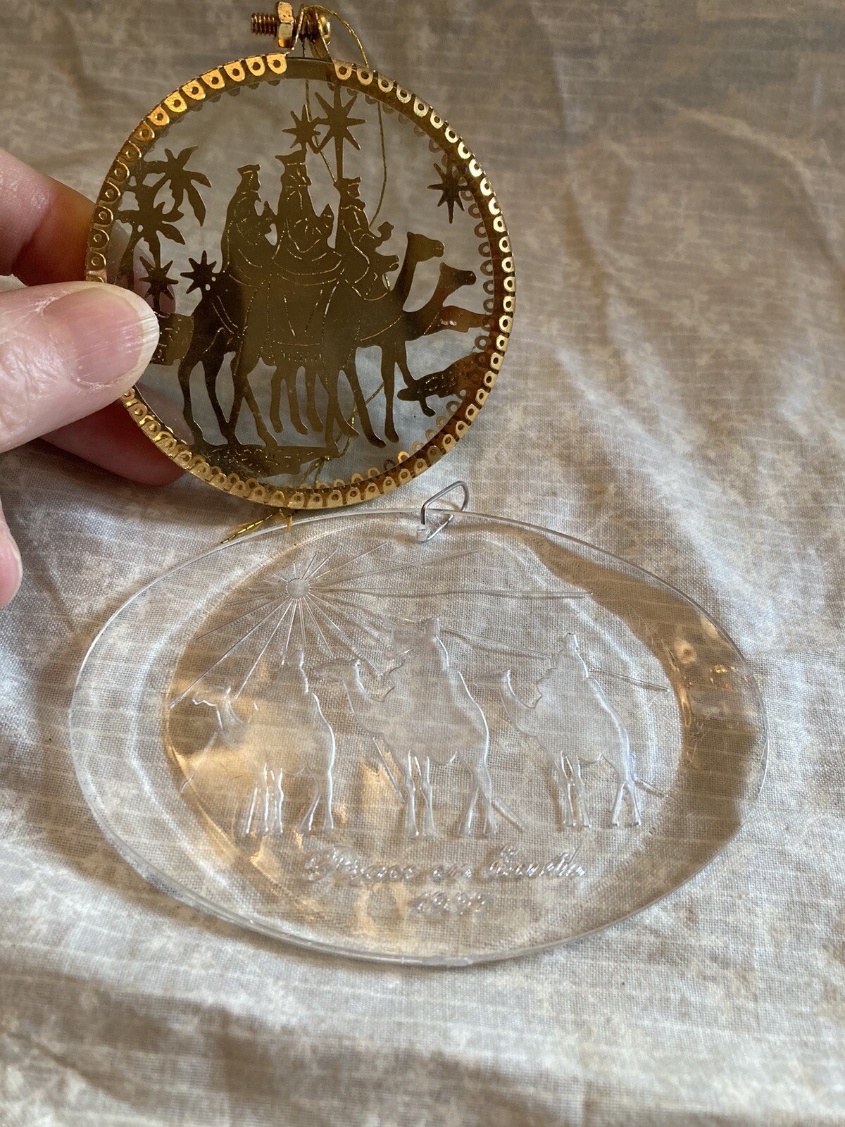 2 three kings ornaments. Brass and glass round one is heavy. 2.5 in. Oval plas