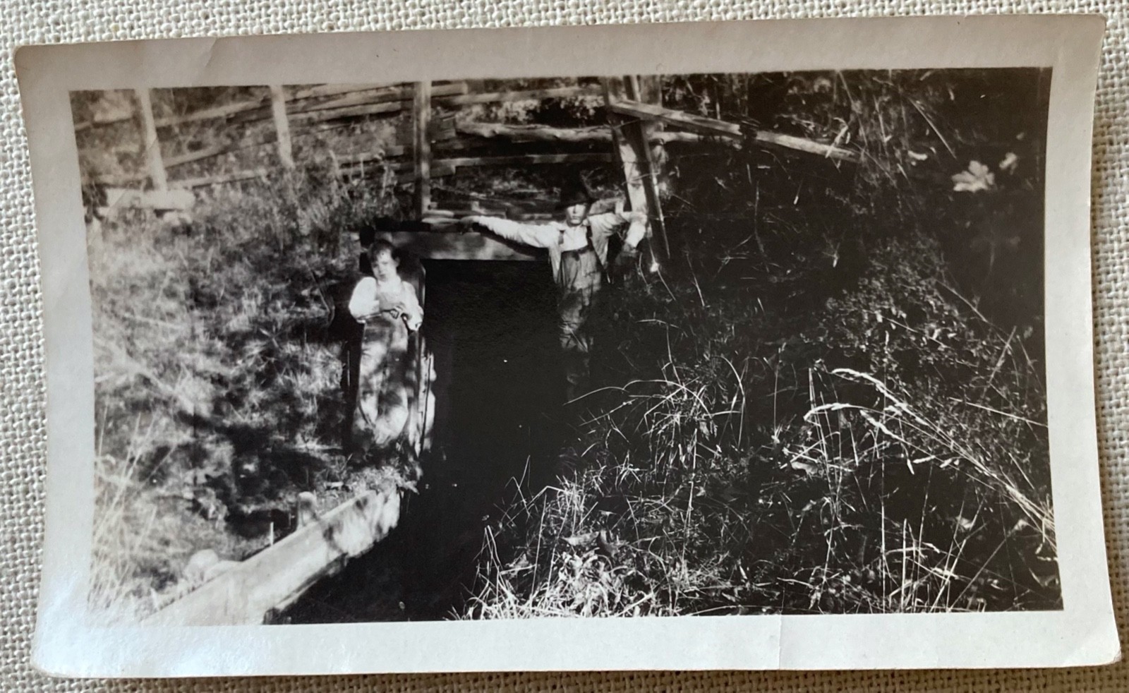 Vtg Photo Father & Son In overalls Standing Under Bridge Nature B&W 4.5″ x 2.75″
