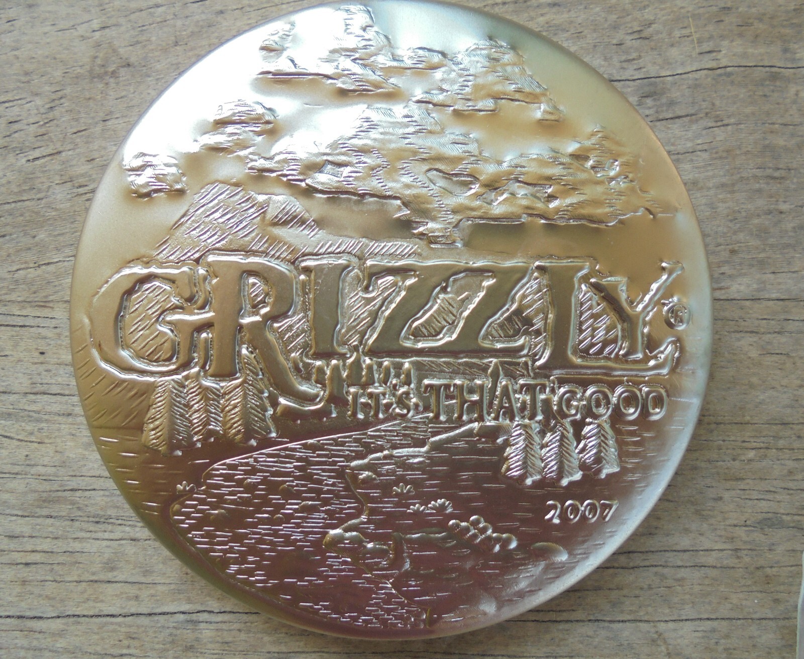 2007 Grizzly Premium Metal Snuff Can Lid “IT’s THAT GOOD”-new/unused