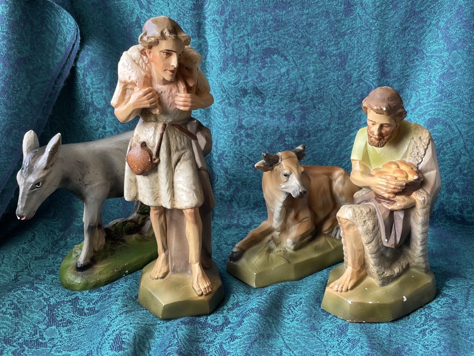 Four Large Chalkware Nativity Figurines, Donkey, Cow, Shepherd with Lamb, Baker