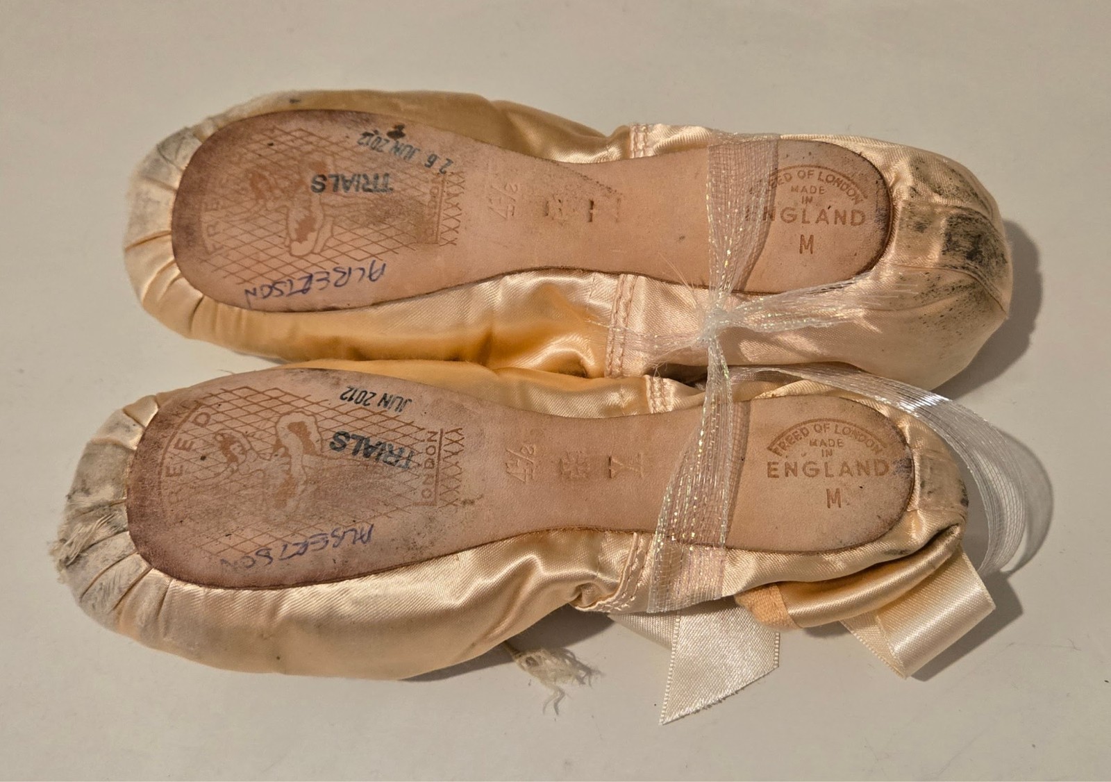 Performance worn ballet slippers signed by Prima Ballerina, Tricia Albertson