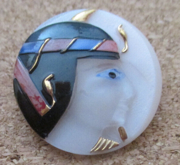 1 – Raised Multicolored Cleopatra on a Pink Button #12 .995 = 25.26mm