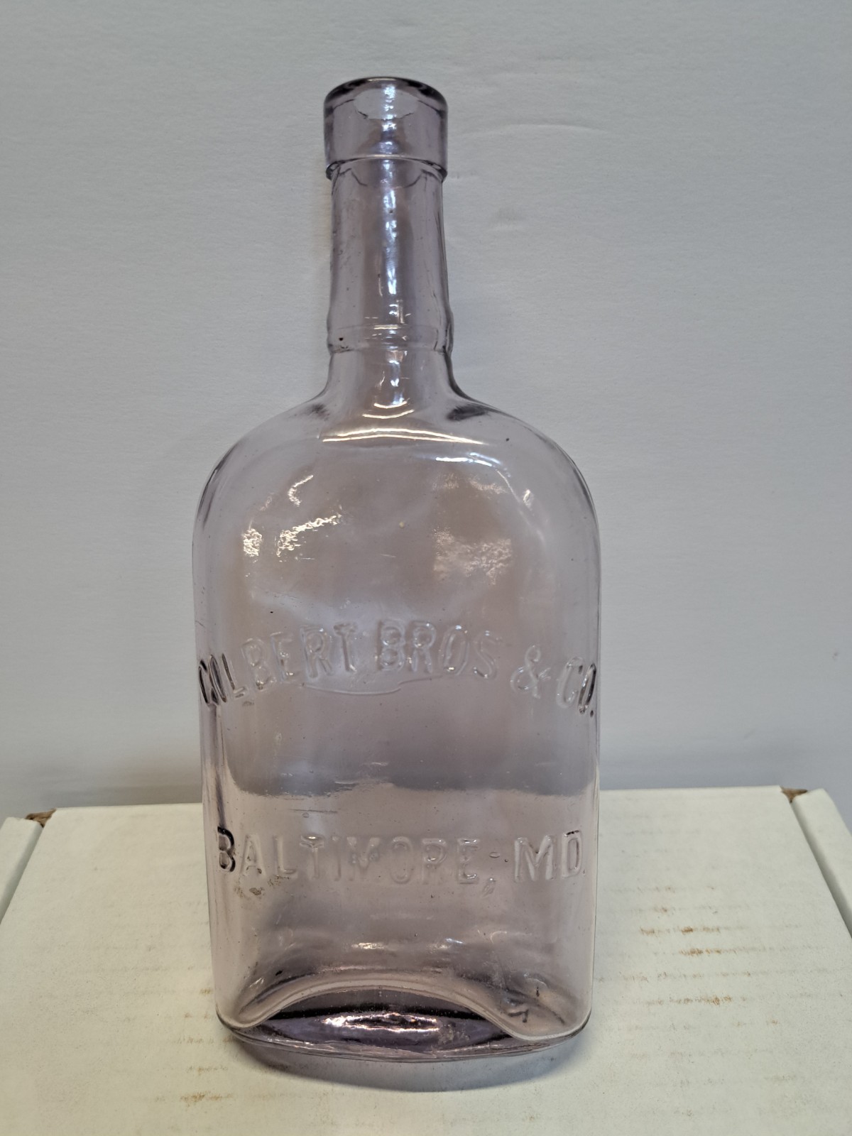 Antique Gilbert Bros & Co Baltimore MD Embossed Amethyst Purple Bottle SCA 8″ T