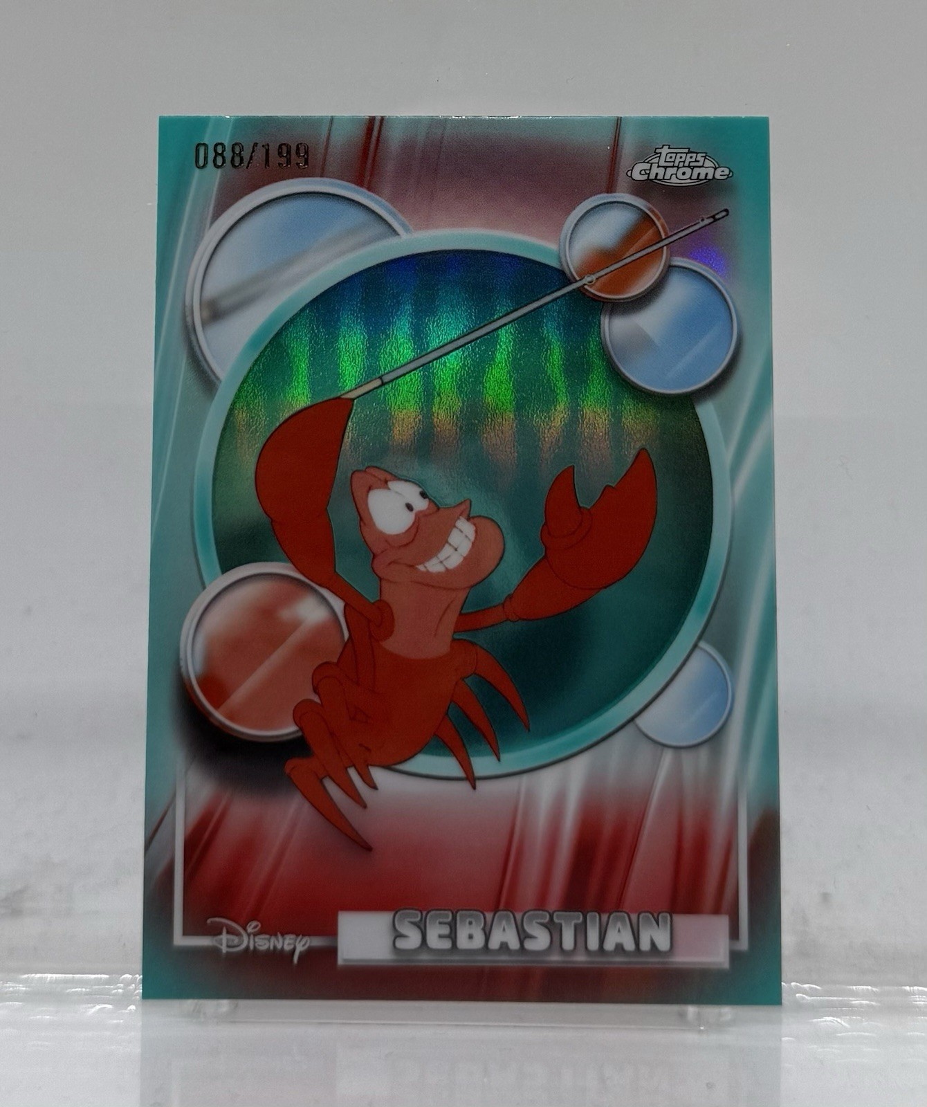 2026 Sebastian Disney Topps Chrome Aqua Refractor /199 #107 The Little Mermaid