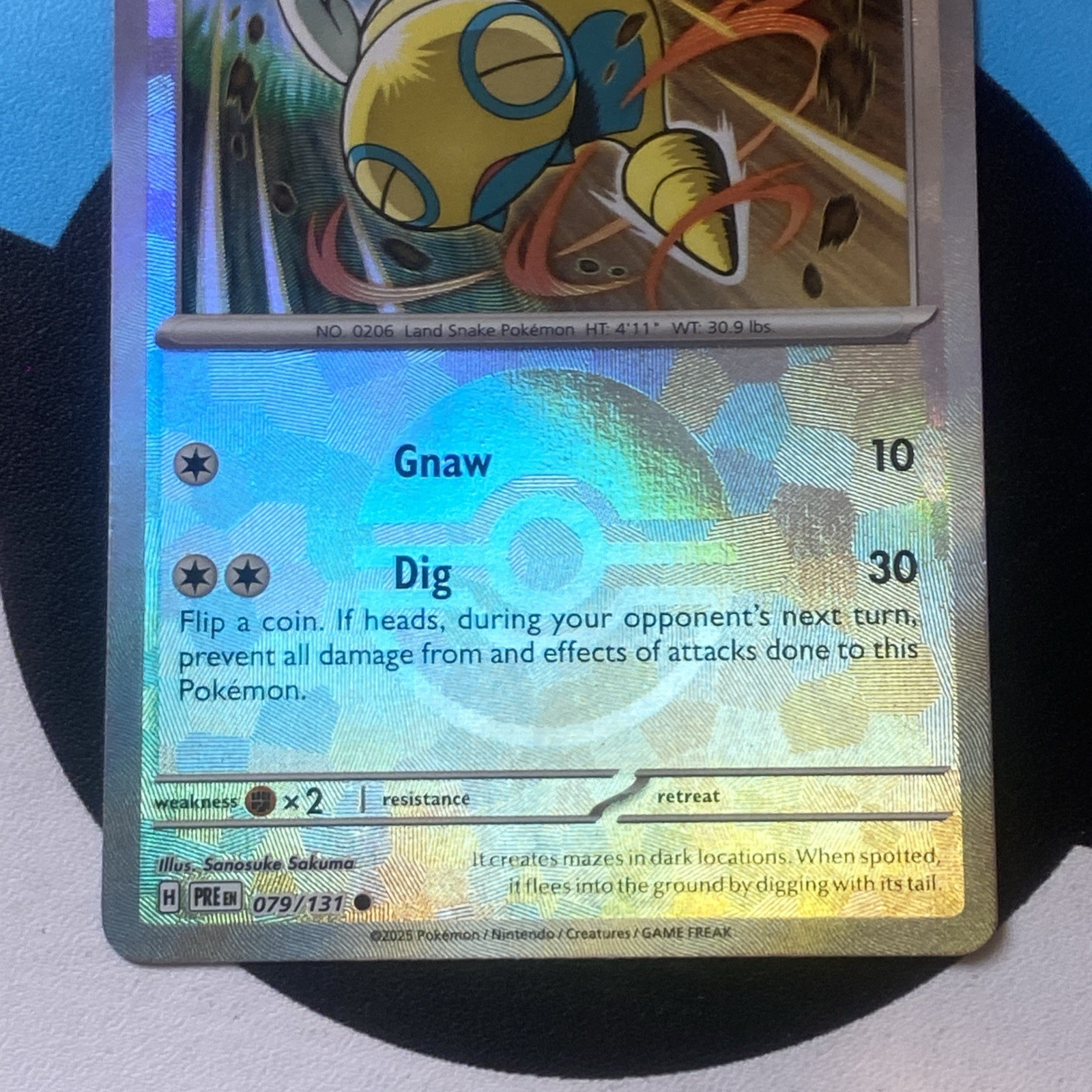 Pokemon Prismatic Evolutions Dunsparce Reverse Holo Card 079/131 pokeball NM