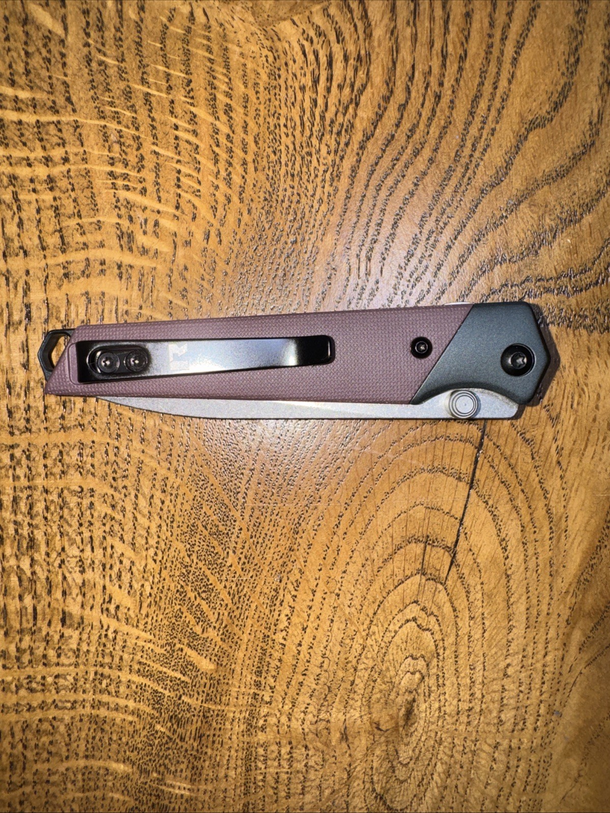 Revo Javelin Rear Linerlock. Thumb Stud. 3″ Nitro V Steel Blade. Plum FRN Scales