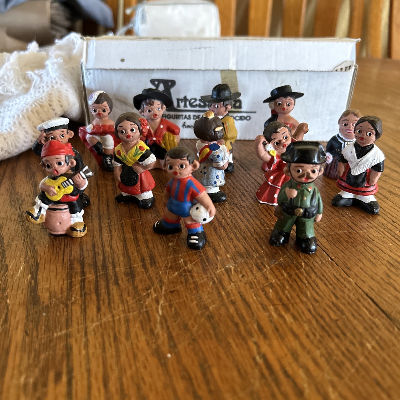 Lot of 13 VTG Spanish Mud People Clay Figurines Sports Medical Military