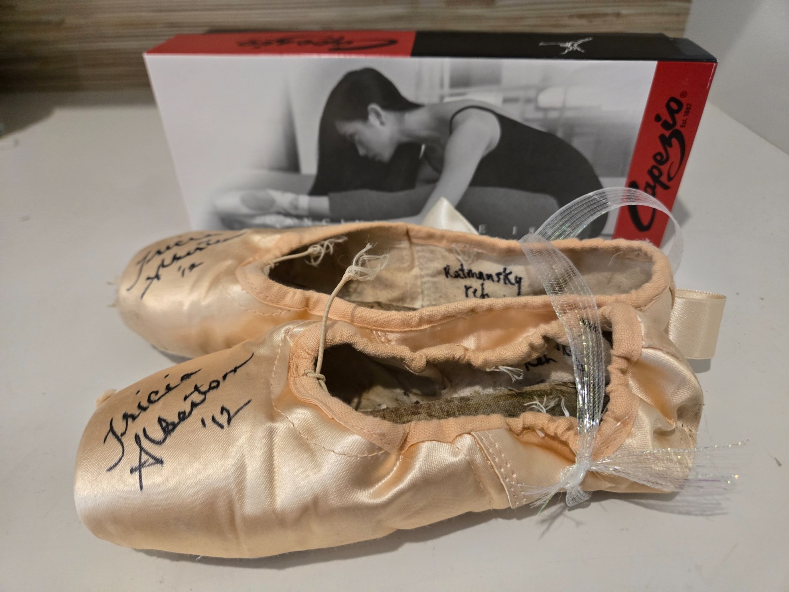 Performance worn ballet slippers signed by Prima Ballerina, Tricia Albertson
