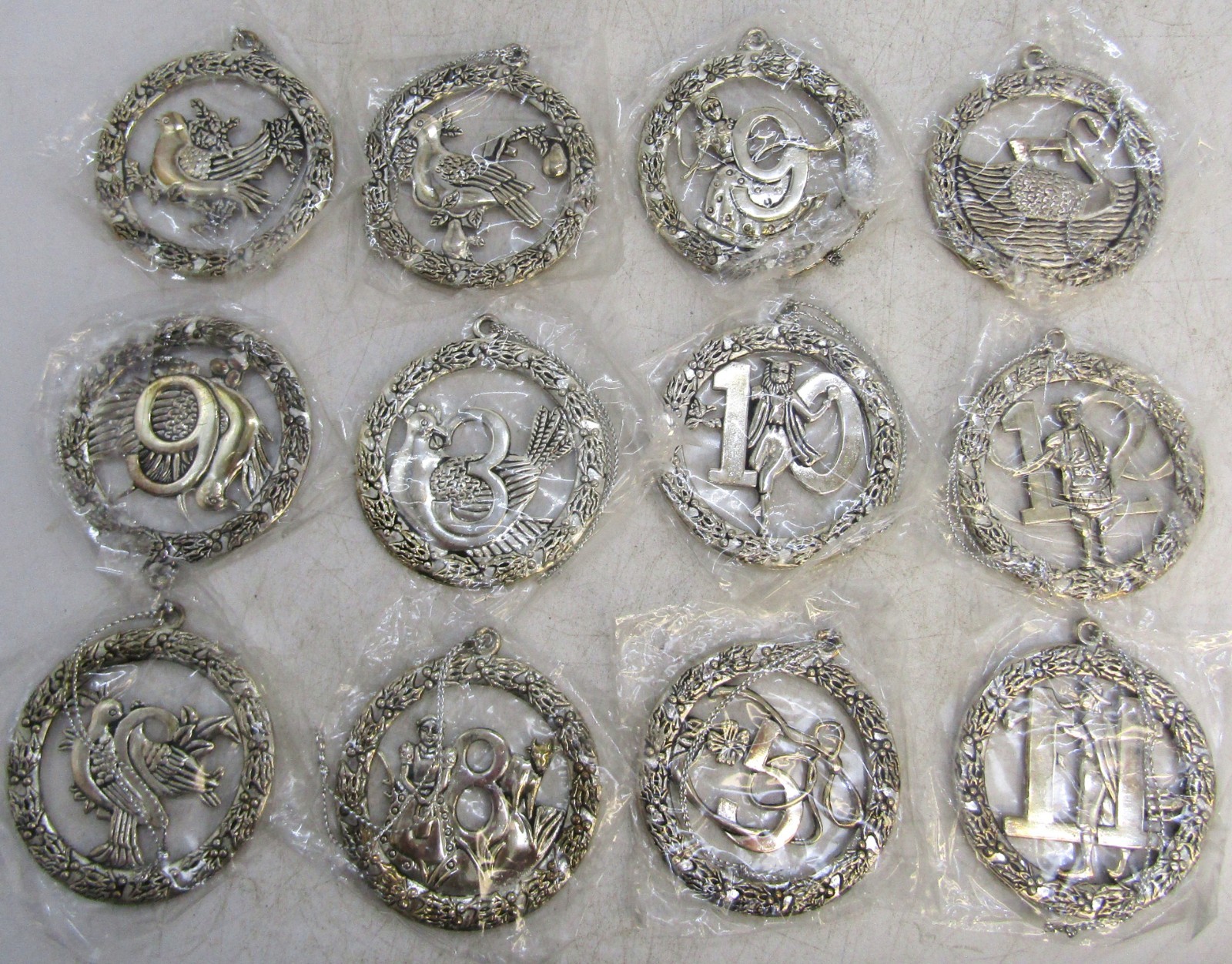 Vintage May Department Stores, Silver Plated 12 Days of Christmas Ornaments.