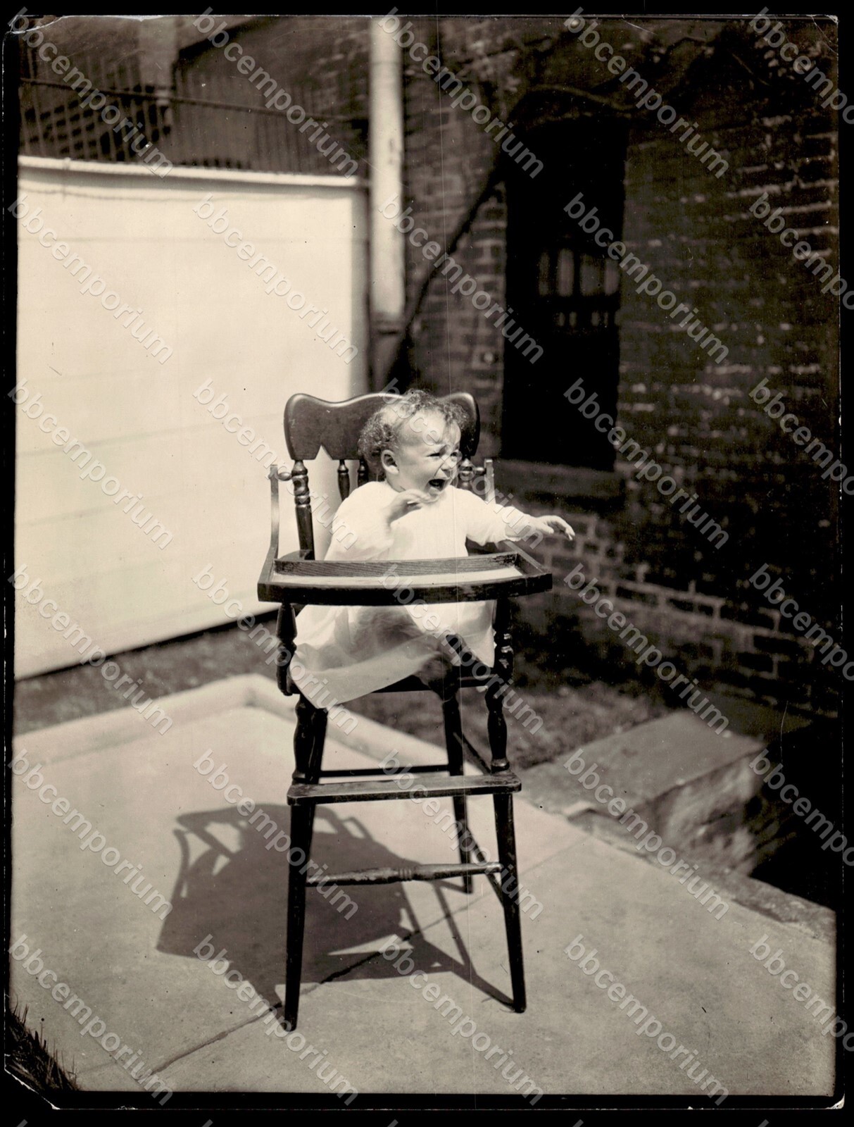 Baby crying in highchair 6.5″ x 8.5″ Brown Brothers Type 1 Photograph C133