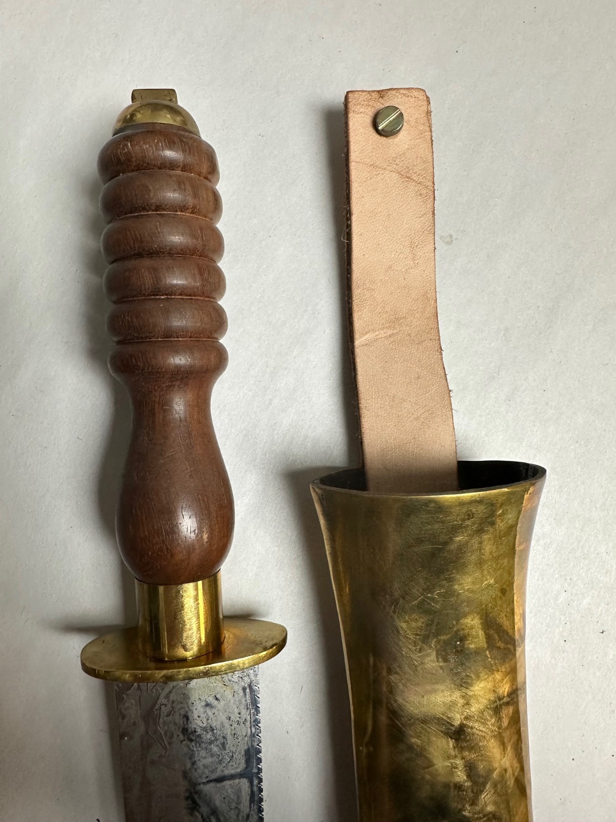 UNKNOWN ORIGIN DIVING KNIFE BLADE MARKED WITH REPLACEMENT LEATHER LOOP.