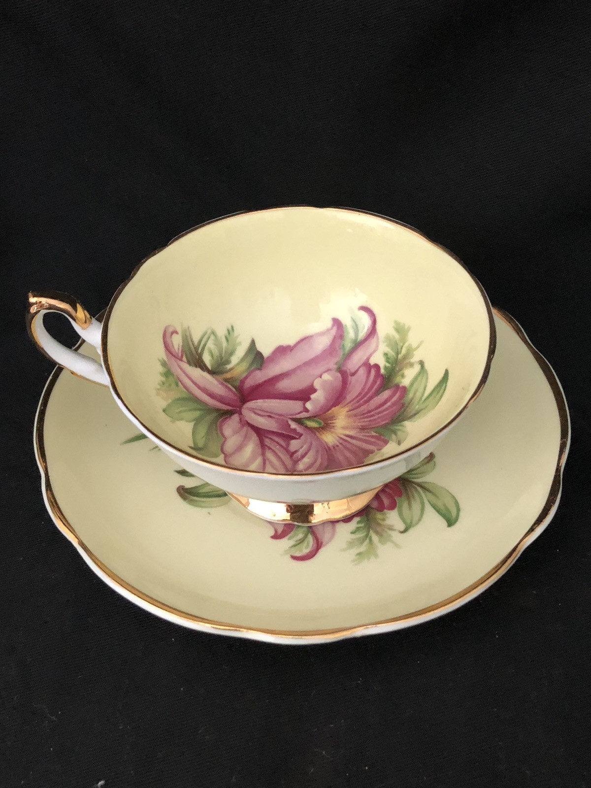 VINTAGE REGENCY TEA CUP AND SAUCER YELLOW WITH LARGE PINK ORCHID
