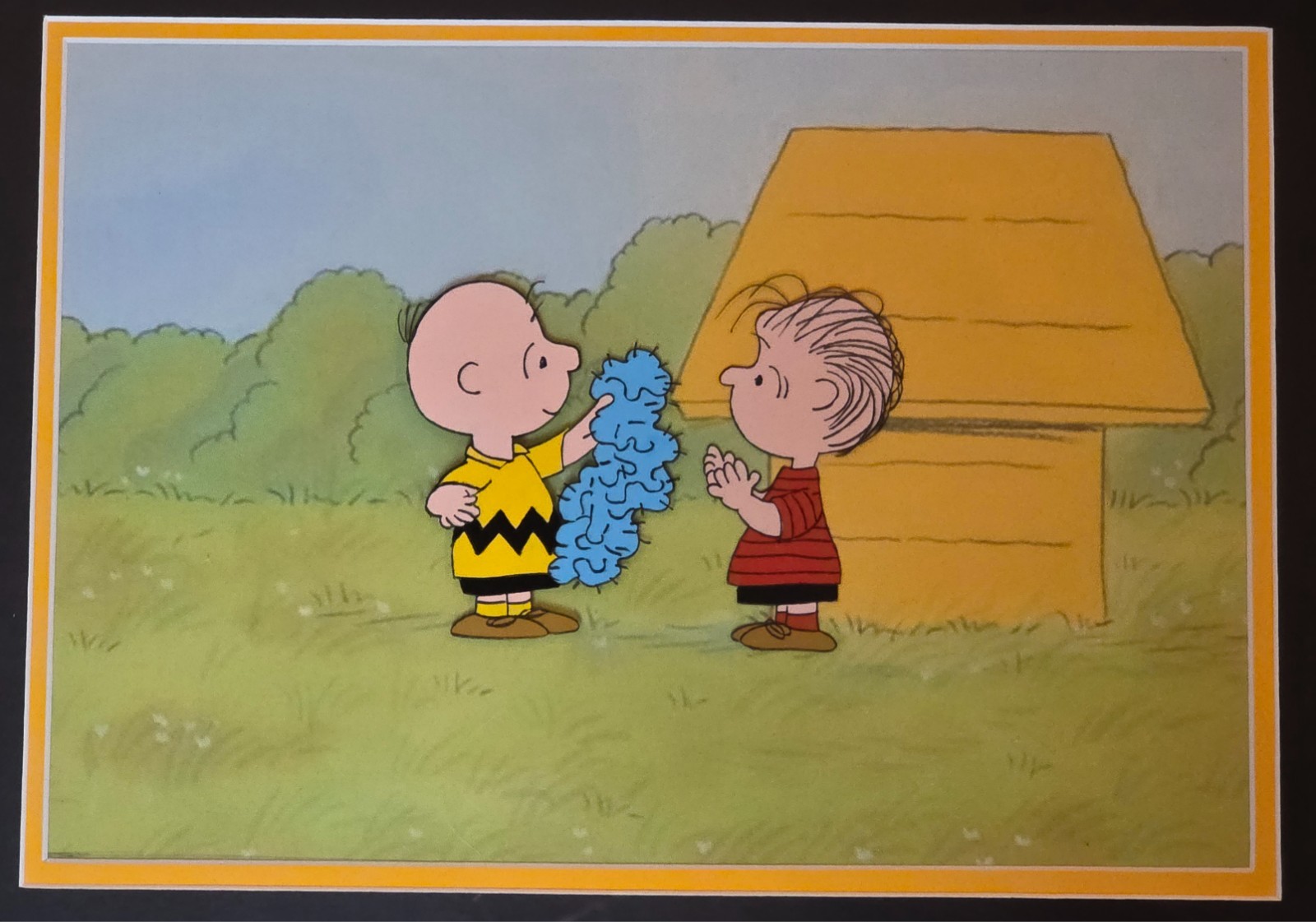 1970s PEANUTS PRODUCTION ANIMATION CEL OF CHARLIE BROWN & LINUS – COA FRAMED