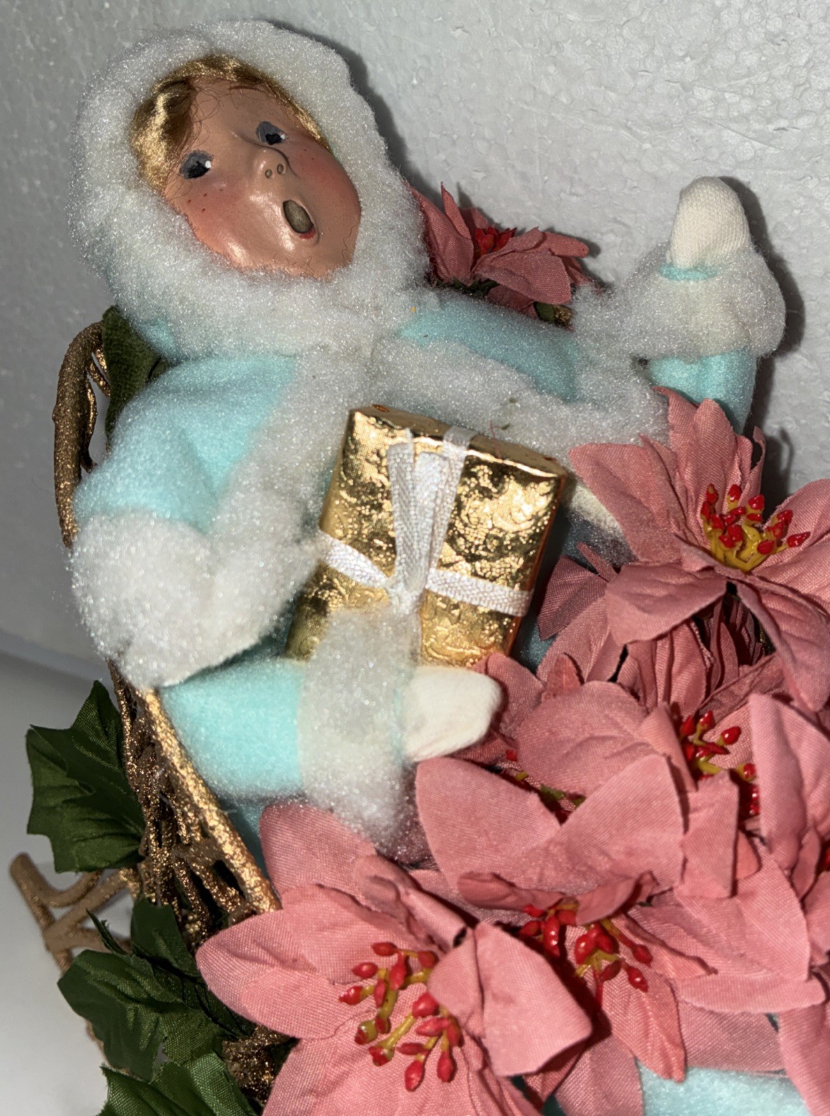 Buyers Choice Singing Girl in Sleigh with Gift, Bell And Poinsettias, 10.5” X 9”