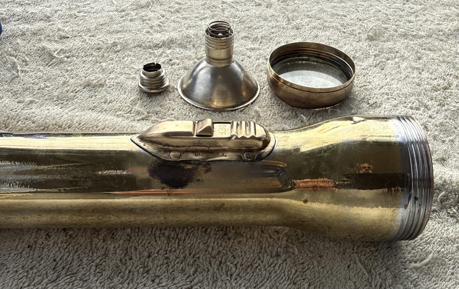 VINTAGE CIRCA 1930’S “BULLET” FLASHLIGHT, WORN TO BRASS FINISH – GLASS LEN
