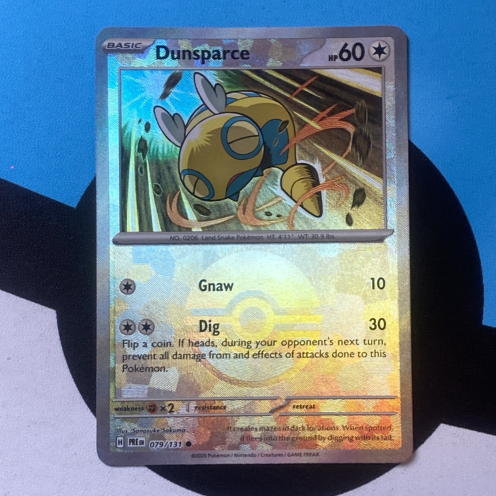 Pokemon Prismatic Evolutions Dunsparce Reverse Holo Card 079/131 pokeball NM