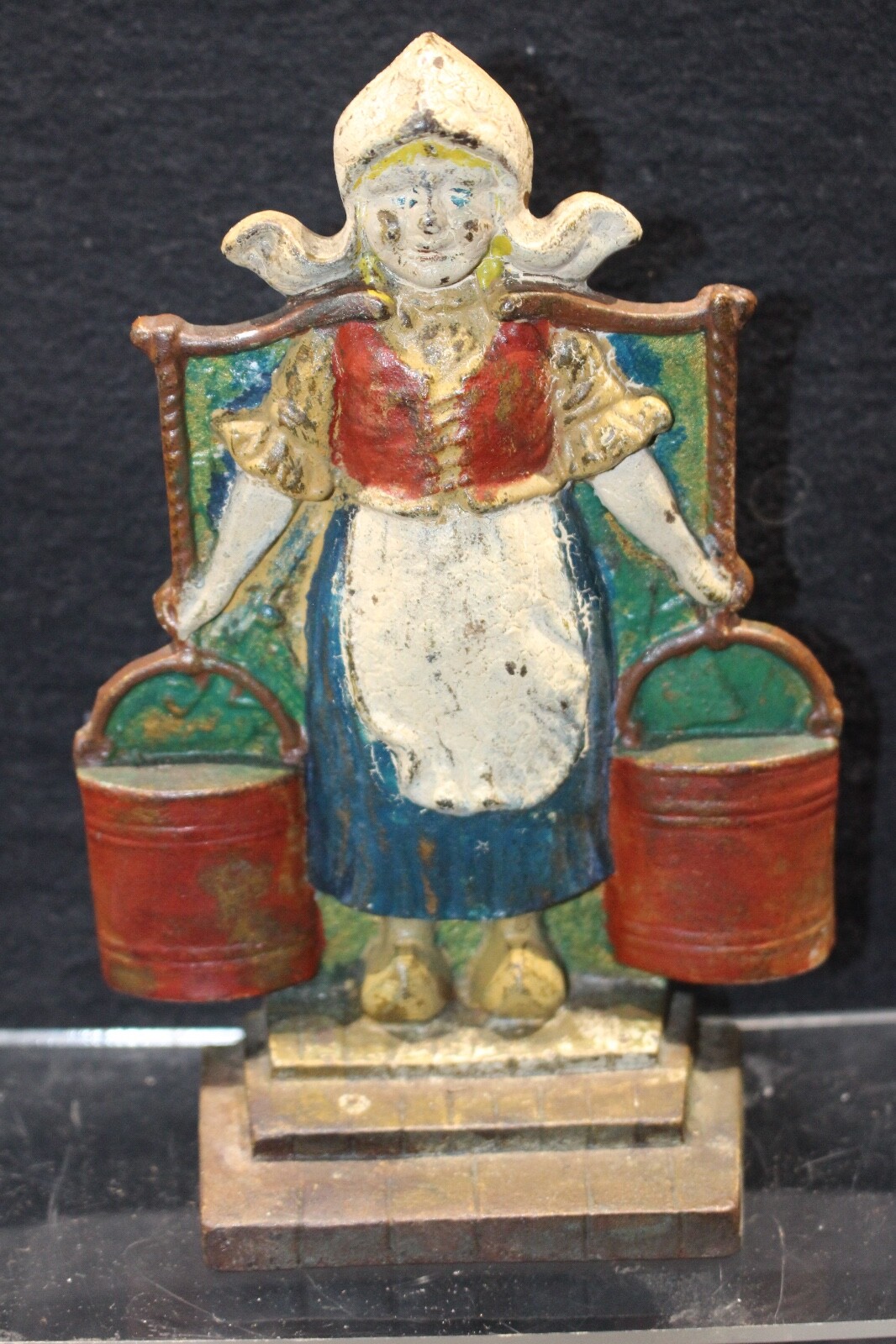 Antique Dutch Girl Iron Door Stop in Very good condition 6 3/8″ X 4 1/4″