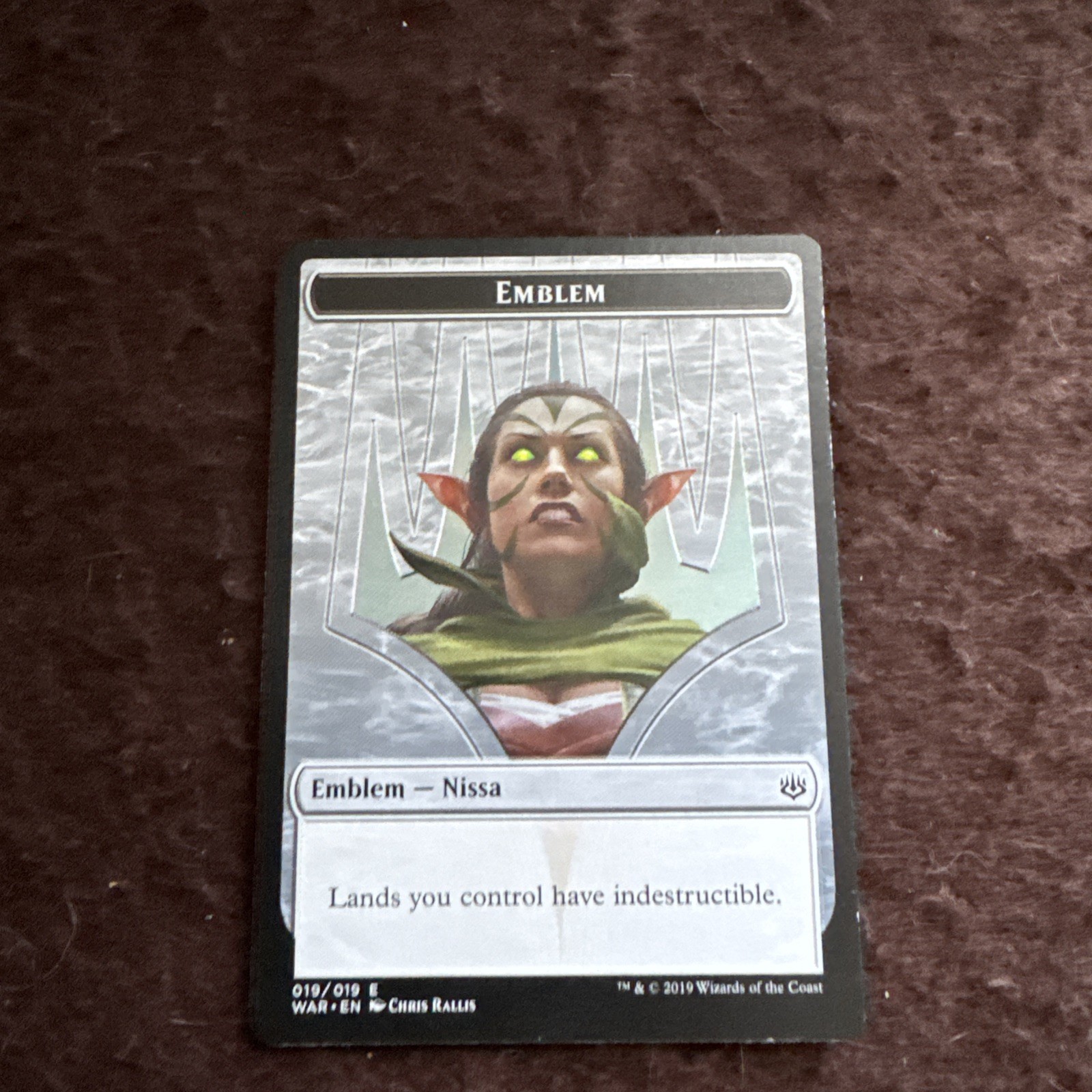 MTG Emblem – Nissa, Who Shakes the World, Light Play, English War of the Spark