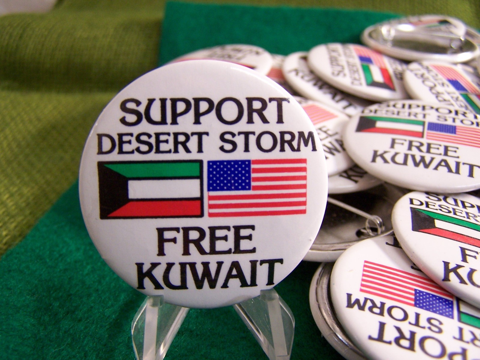 “Free Kuwait, Support Desert Storm” cello pin-back button, 1991.