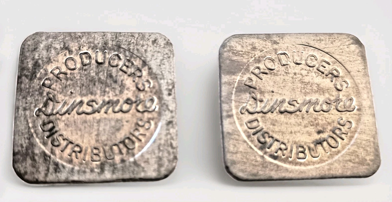 2 Dinsmore Producers Distributors Dairy Farm Token Good 1 Quart of Milk 1950s