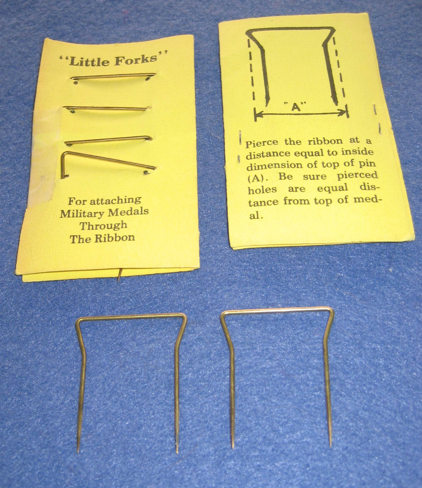 “Little Forks” mounting attachment for European medals