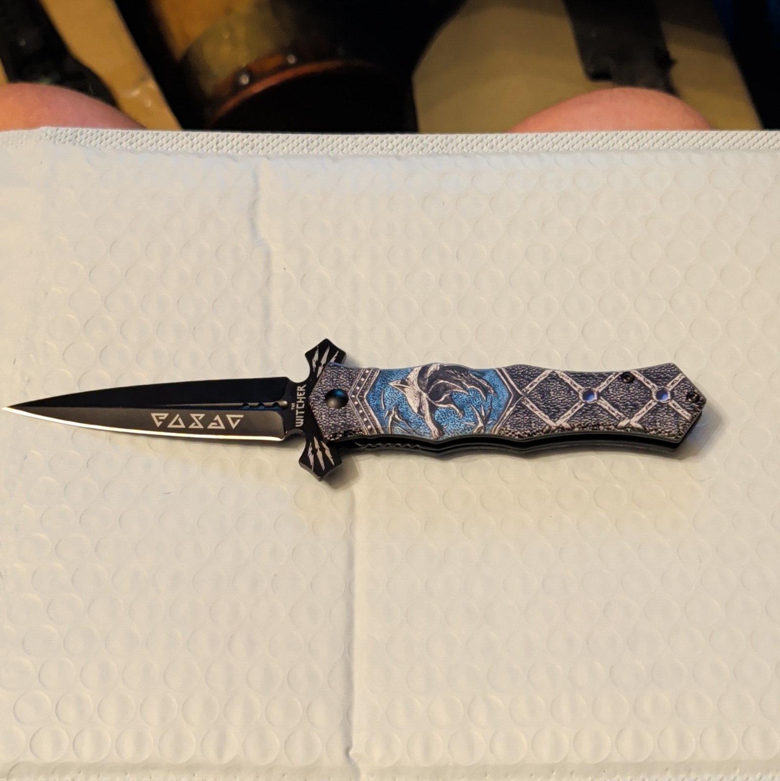 The Witcher Blue/Black Folding Pocketknife SS Drop Point Plain Liner Lock Manual