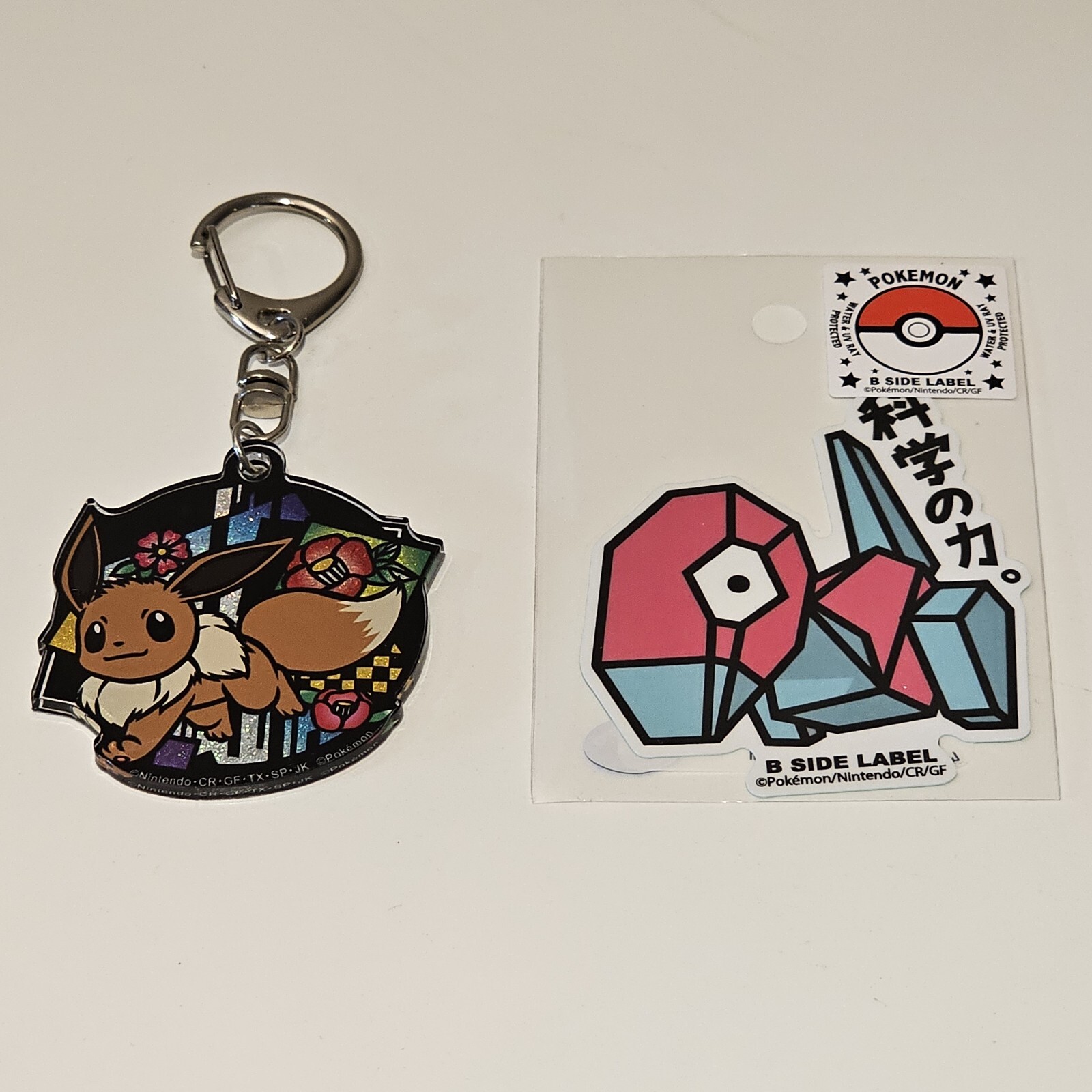 JP IMPORT EEVEE KEYRING and PORYGON B Side Label Sticker Pokemon Center Keychain