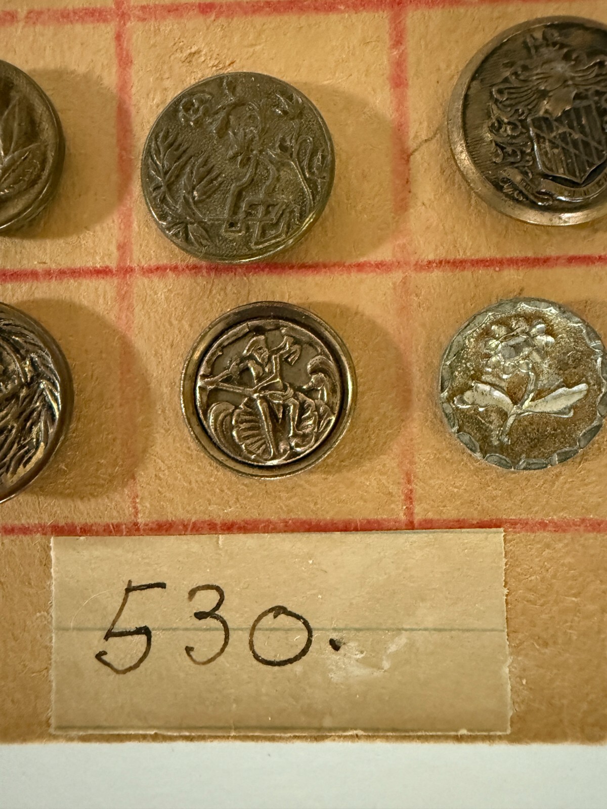 Vintage Sewing Button Collection on large cardboard silver, gold, jets, clear