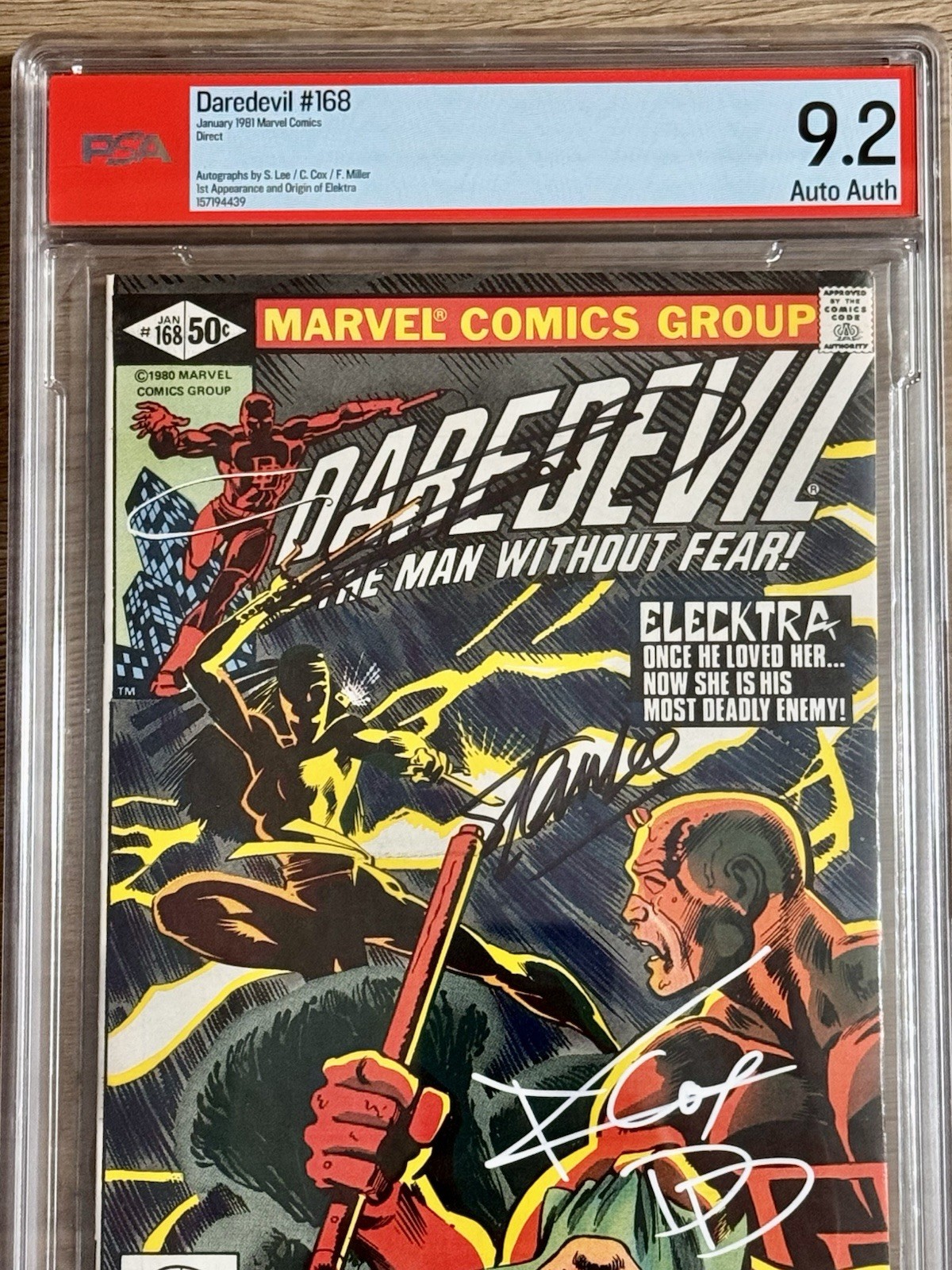 DAREDEVIL # 168 ,1st ELEKTRA SIGNED STAN LEE, CHARLIE COX & FRANK MILLER PSA 9.2