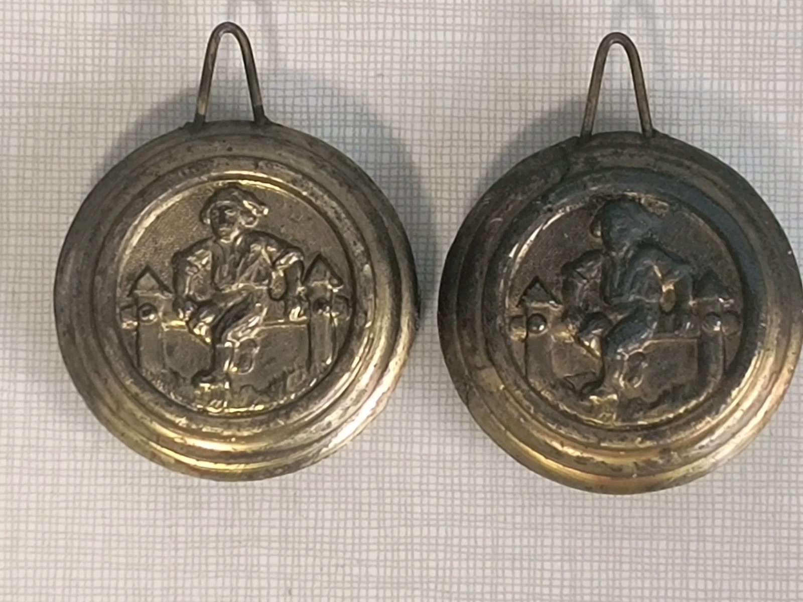 Pair Of Original Seth Thomas “Boy on the Fence” brass clock pendulum bobs 4.7 oz