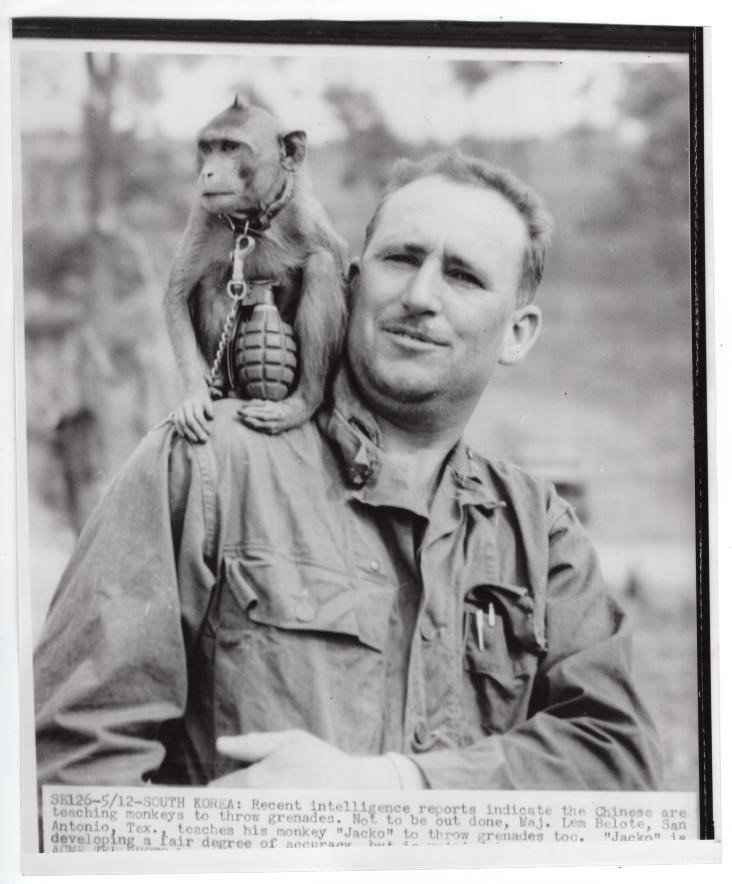 1950-53 Korea Major Belote Teaches Monkey to Throw Grenades News Telephoto