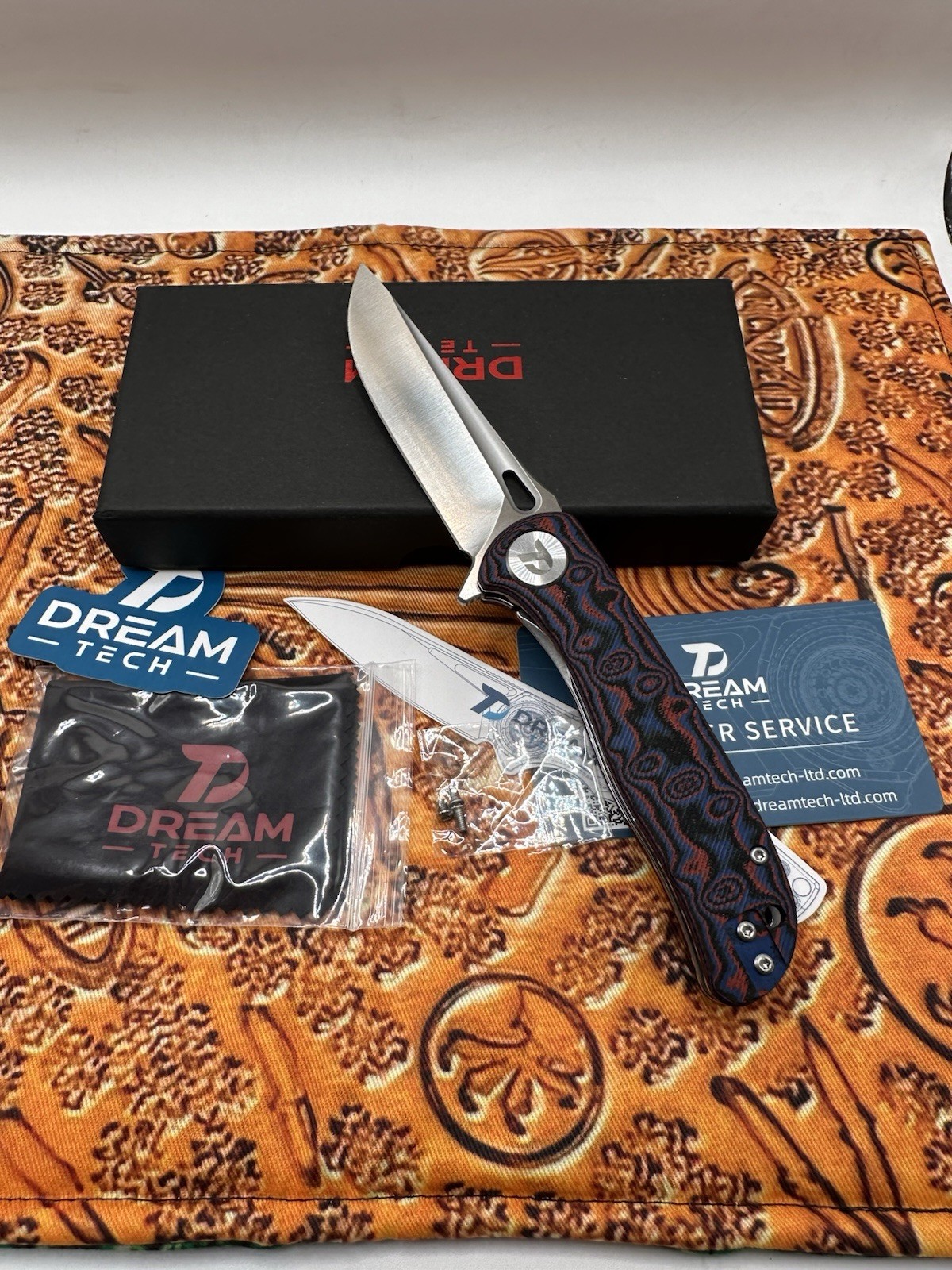NEW DreamTech D3898MR Knife: Red, Blue, & Black Raindrop Micarta, 3.27″ D2 Blade