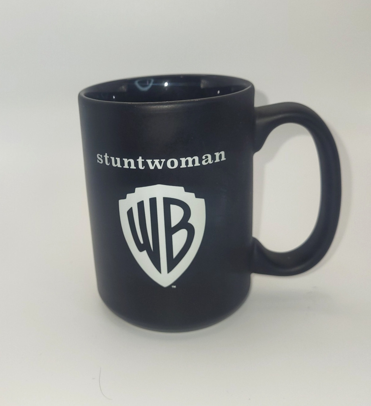 Warner Bros Studio Coffee Mug WB Shield Stuntwoman Black Matte Finish 16 ox