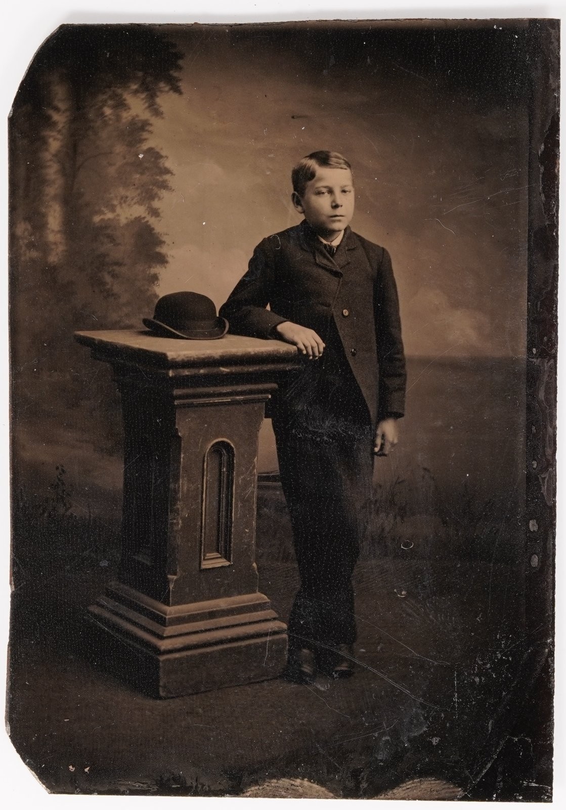 Antique Sixth Plate Tintype Young Boy Suit Leaning Pedestal Bowler Hat Studio