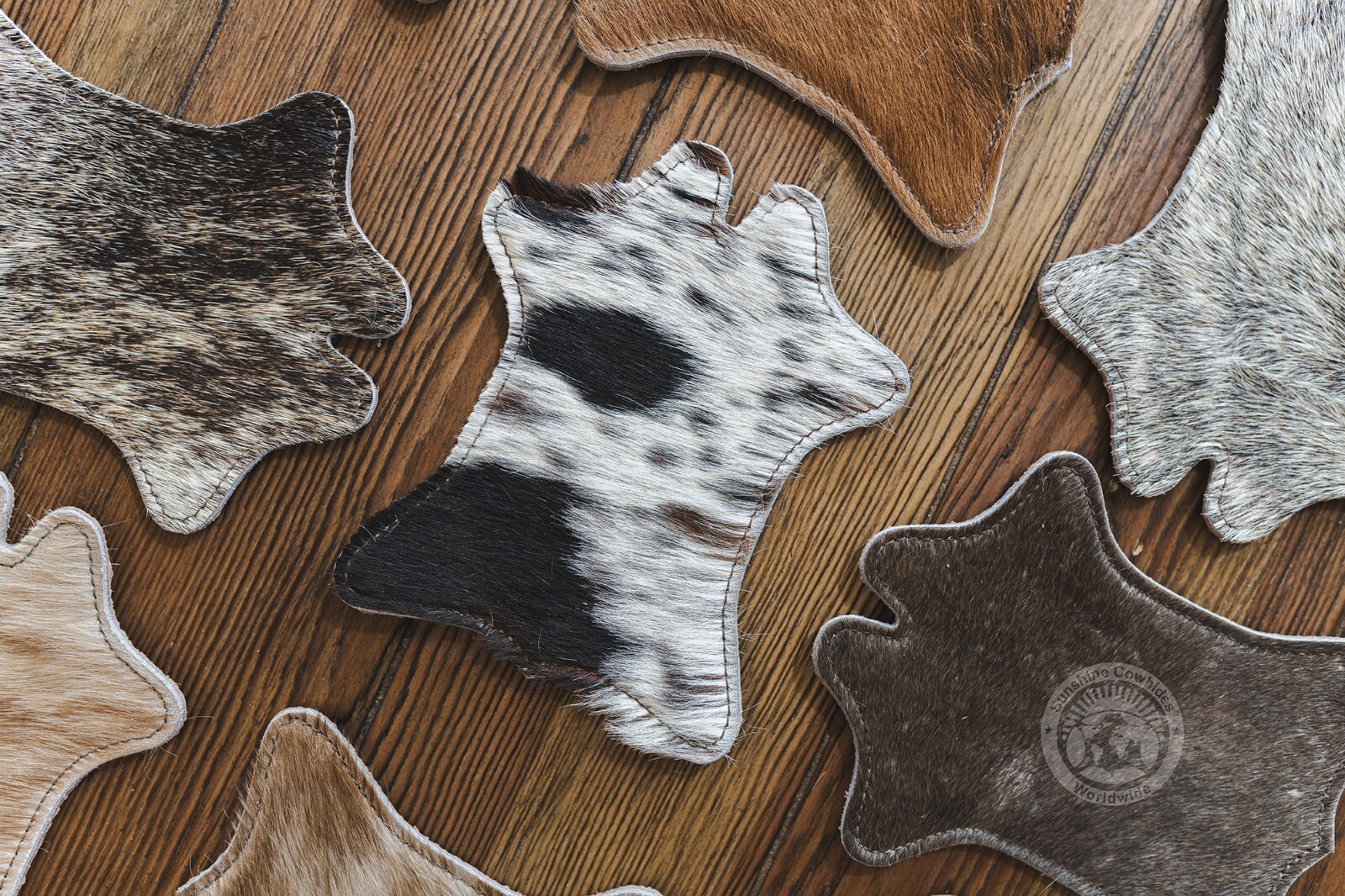 Cowhide Coaster Plain Assorted – Size 4.9 x 5.9″ – – SET OF 12