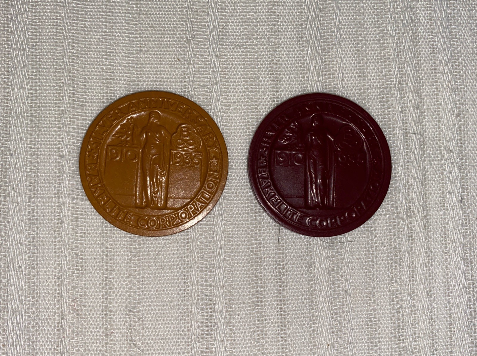 2 Bakelite Corp Silver Anniversary (1910-1935) Medallions, Butterscotch/Burgundy