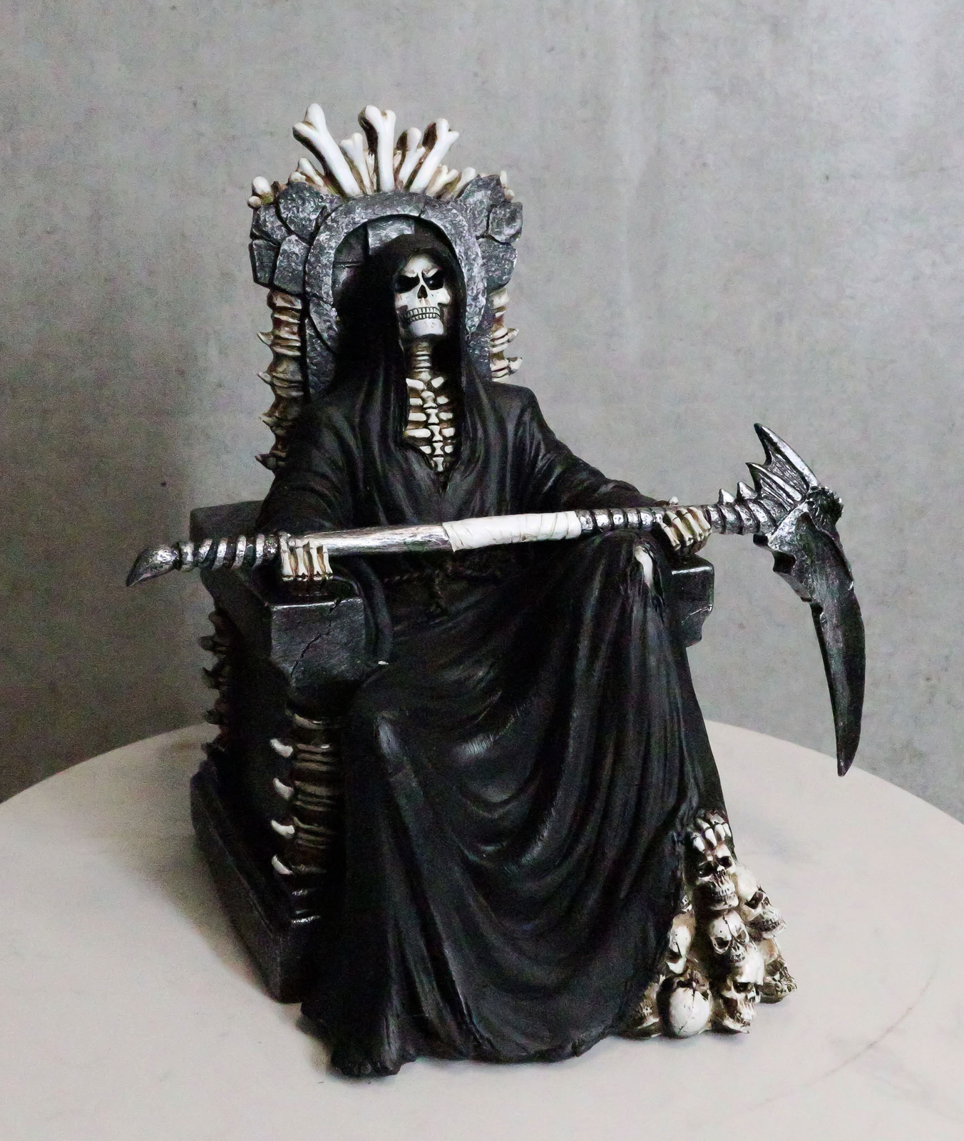 Black Holy Death Grim Reaper Sitting On Skeleton Skull Throne Figurine 10.5″H