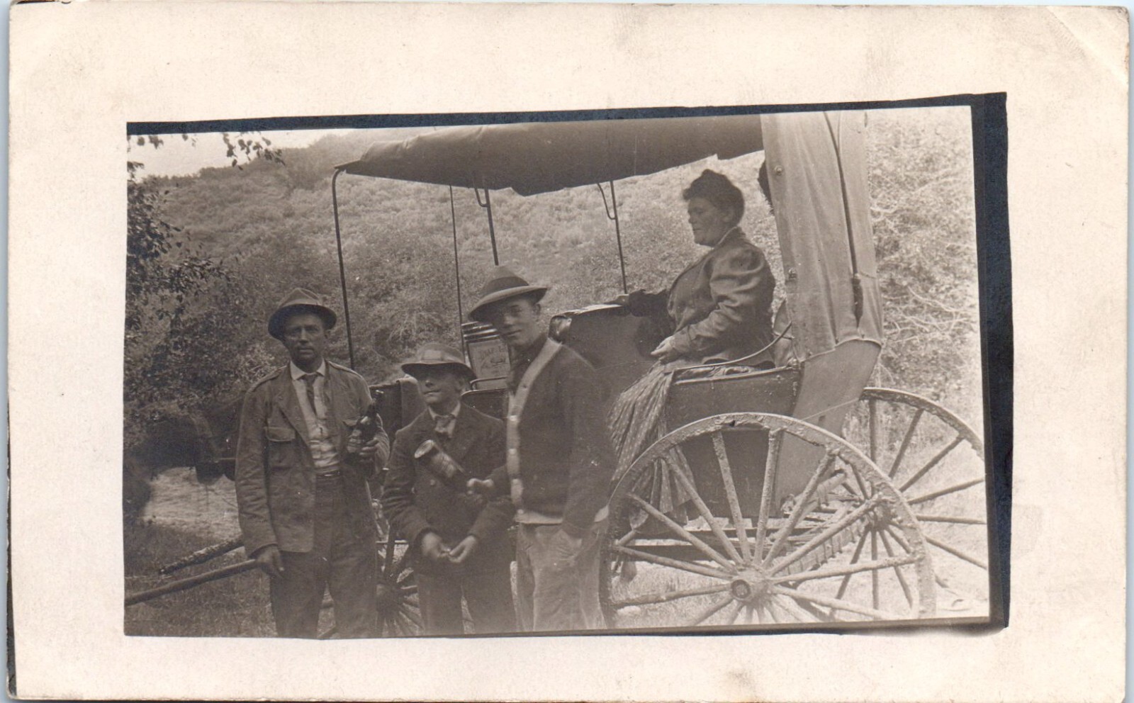 1907 – 1918 Anonymous People Men with Beer Bottles Woman in Buggy RPPC Postcard