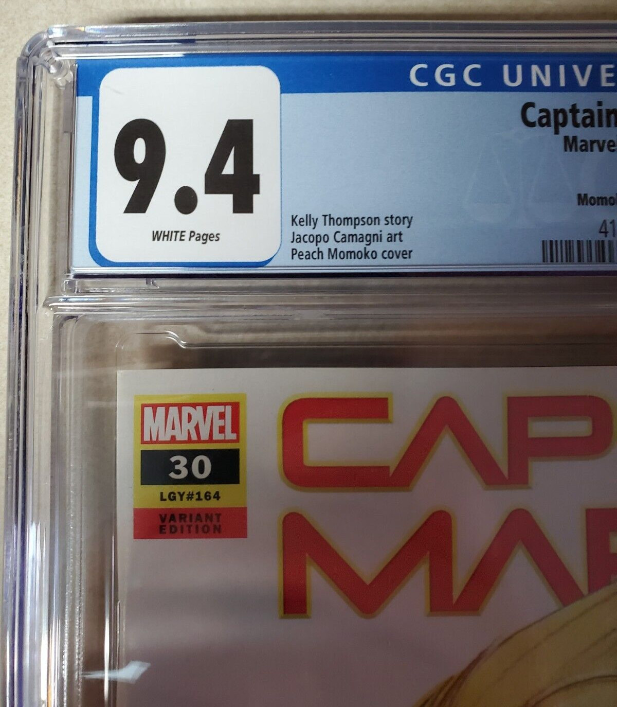 Captain Marvel Issue #30 Comic Book. Peach Momoko Variant Cover. CGC Graded.2021