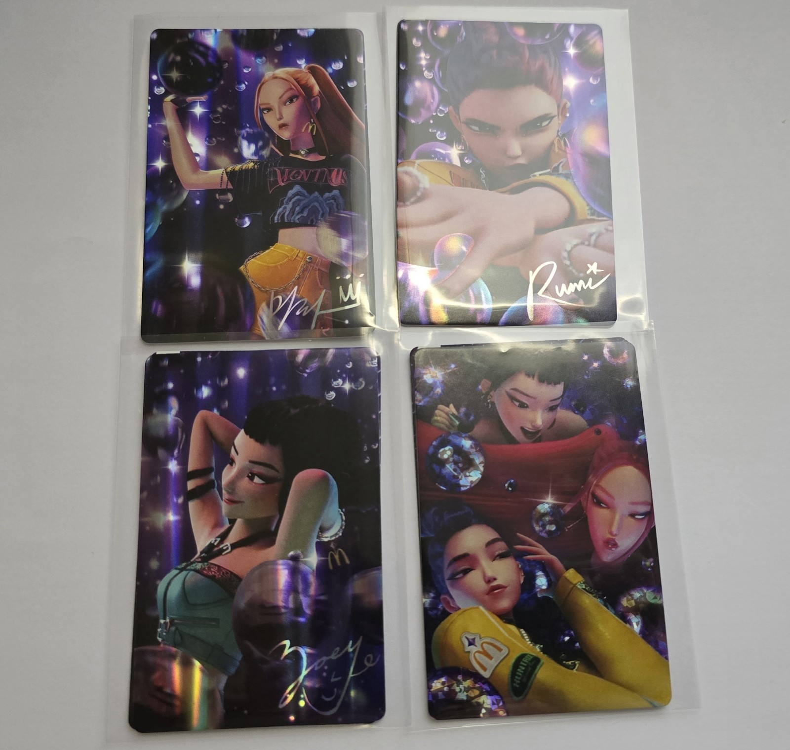 McDonalds K-Pop Demon Hunters Huntrix 4 Card Set w/Codes – Zoey Rumi Mira + Trio