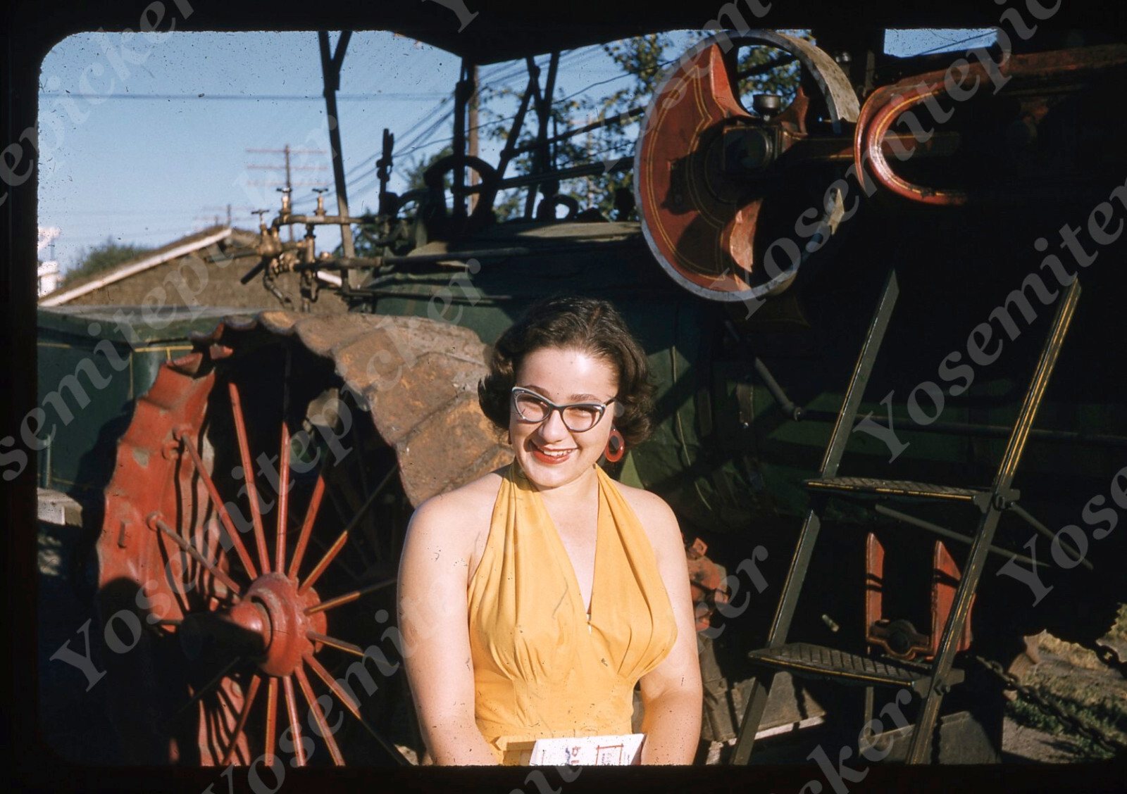 SL04 Original Slide 1950’s Red Kodachrome Young lady old tractor 983a