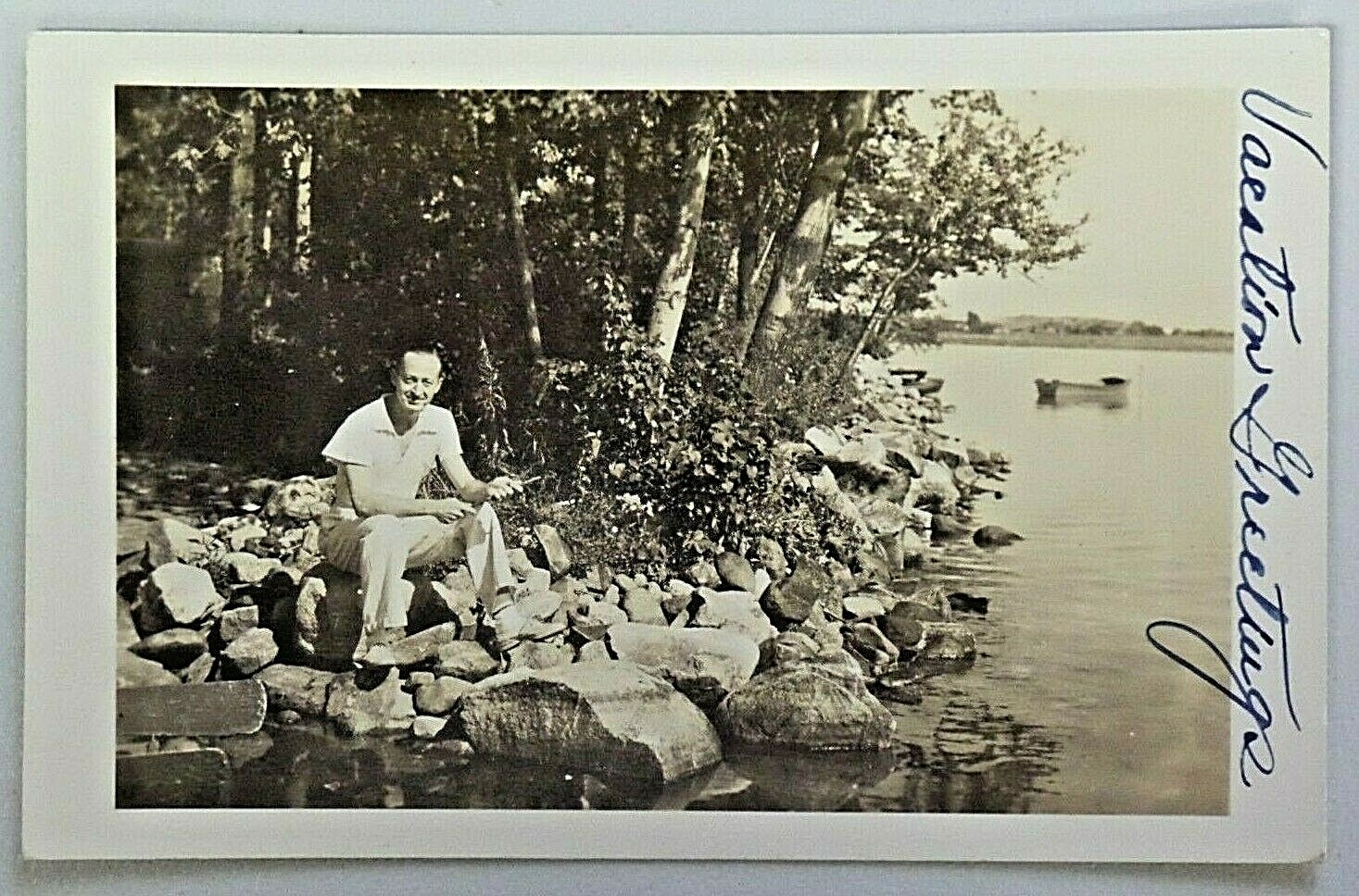 Vacation Greetings Man Sitting on Rocks by the Lake RPPC Postcard 1939 Post 1528