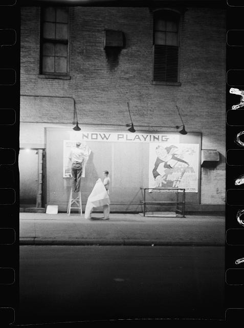 Photo:1930s Now Playing Theater Movie Poster Workers Brick Building